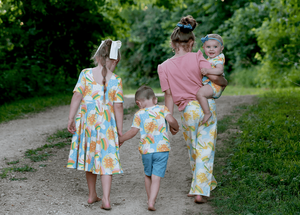 Anise & Ava's Sun collection featuring our annual rainbow, representing hope and happiness. All of Anise & Ava's prints are exclusive & hand drawn eco friendly printed on premium cotton. Designed & made to match all kids from babies to kids. 