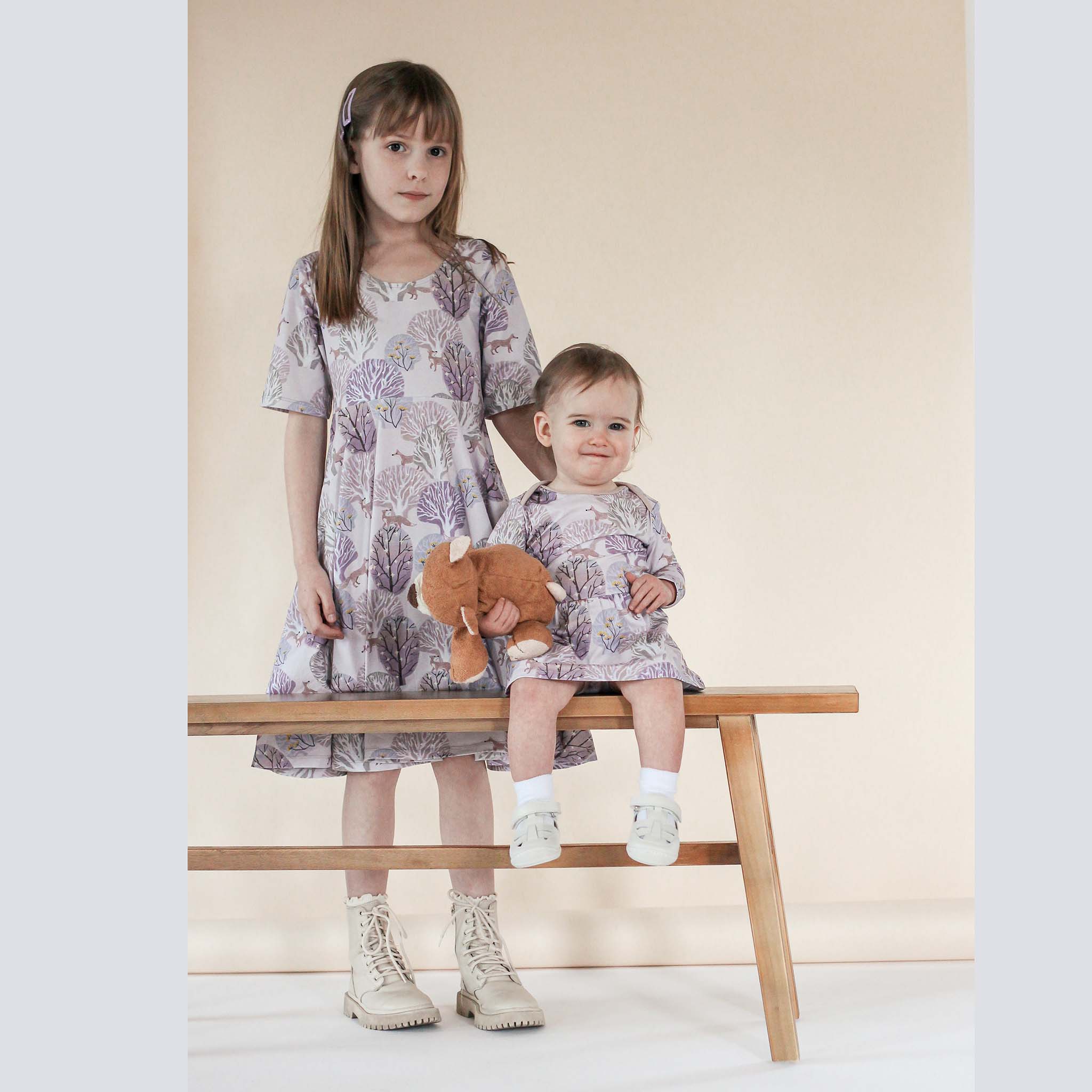 Anise & Ava best selling twirl play dress with deep pockets created in our exclusive hand drawn art for Fall. Made to match with sibling's baby styles in dress and onesie.
