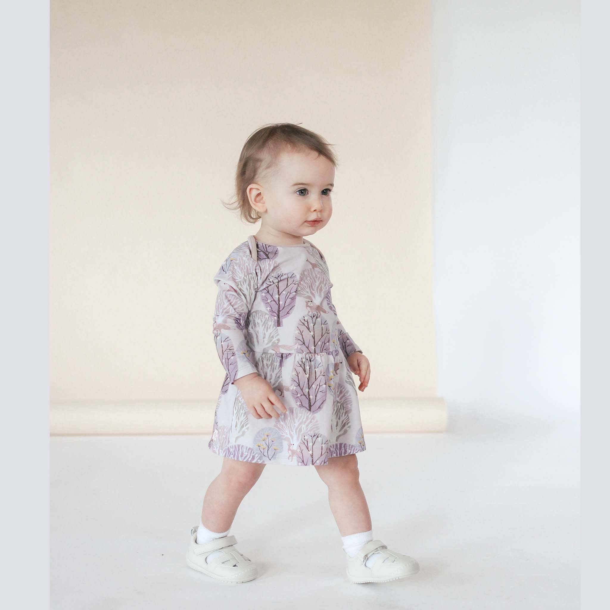 Anise & Ava's most loved baby onesie dress. Made to match with siblings' styles in our hand drawn gender neutral forest print, eco friendly printed onto our soft cotton.