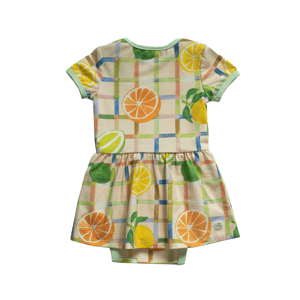 Anise & Ava exclusive hand drawn print in Citrus, eco friendly printed on a stretch luxury cotton for baby. Designed and made to match siblings styles in kids. 