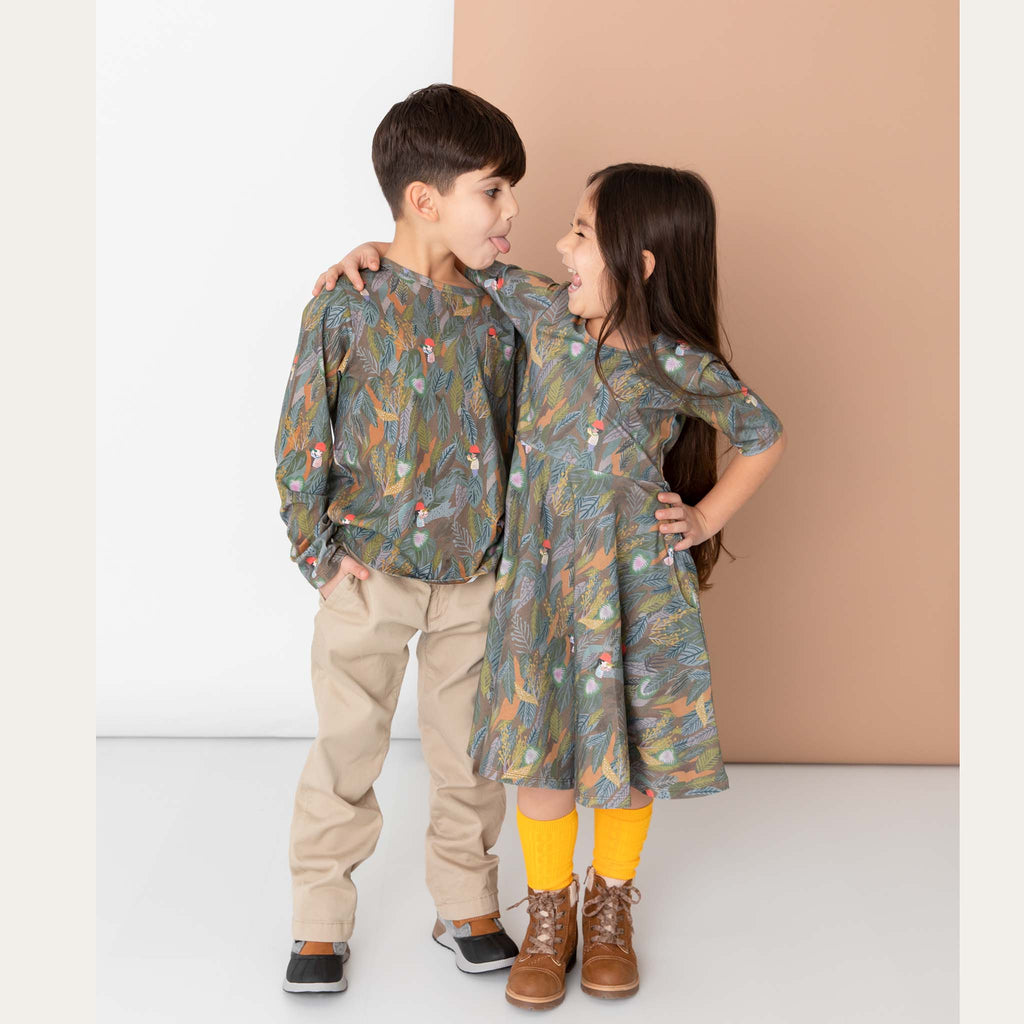 Anise & Ava gender fluid printed outdoor adventurers eco friendly long sleeves printed tee with pocket. Made with love and original hand drawn art to inspire and to twin with siblings. Here twinning with printed elbow sleeves twirl dress. 