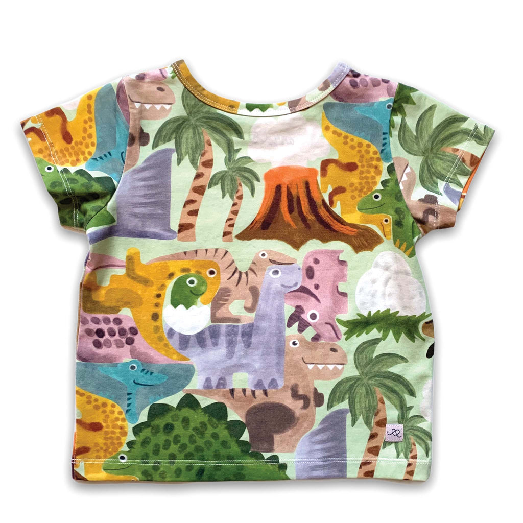Anise & Ava genderless printed tee in Dino Puzzle. Tee with pockets for little treasures. 