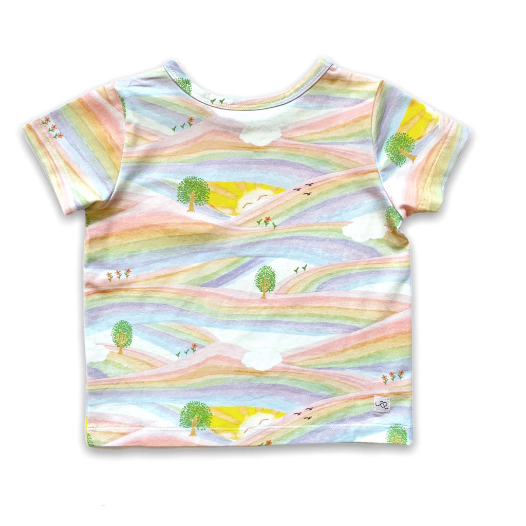 Anise & Ava genderless printed tee in Sunray Rainbow back tee with pockets for little treasures. 