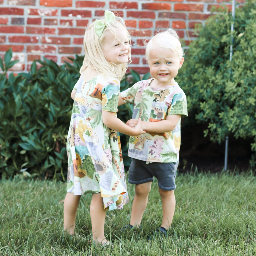 Anise & Ava genderless cotton Tee Brooklyn matching with Twirl dress with pockets "Journey" in Print Dino Puzzle. 
