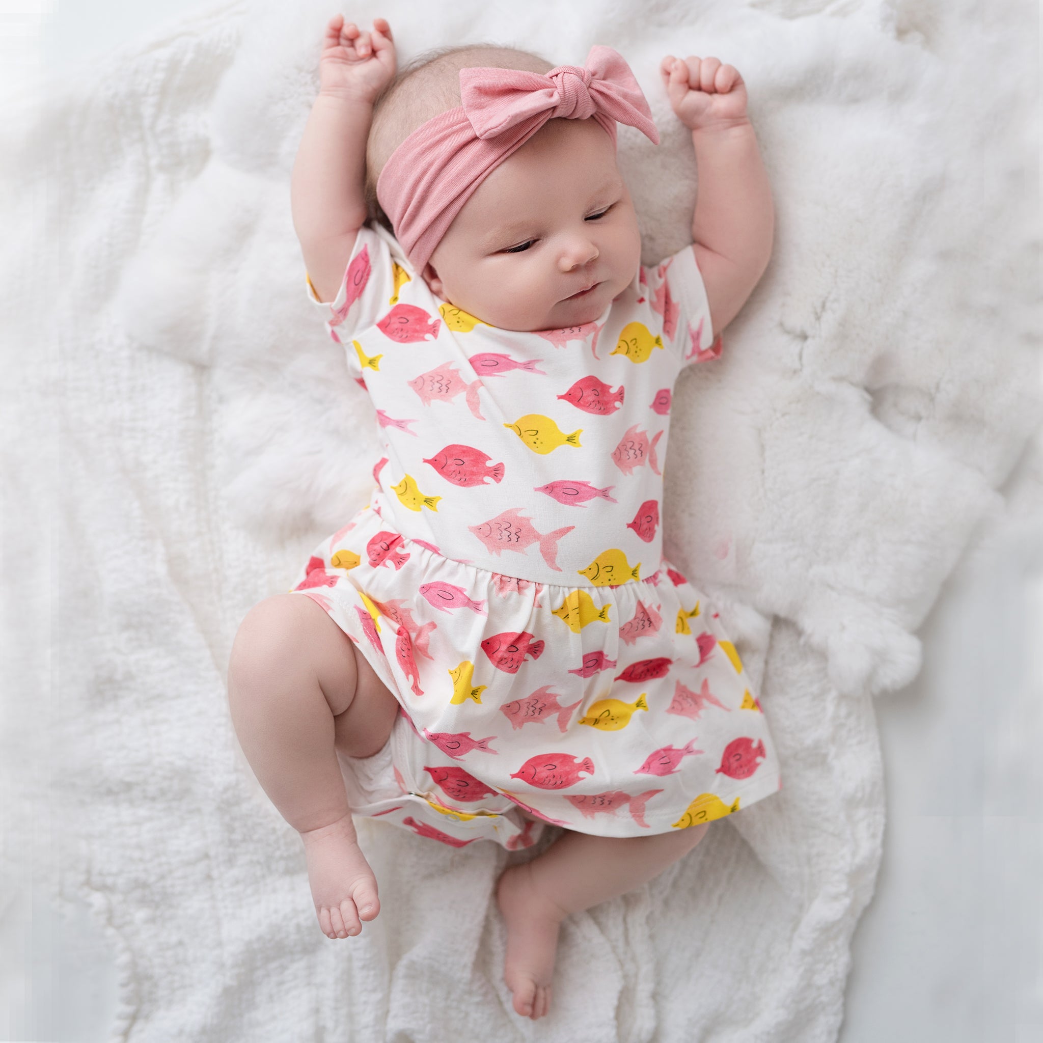Fishes baby onesie dress, fun, colorful, gender neutral print to twin match with siblings and family by Anise & Ava.