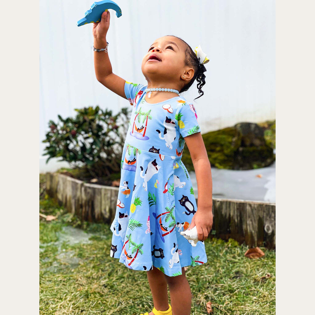 Anise & Ava genderless print VaCation in luxury cotton twirl dress with pockets. Made to match and twin with siblings. 