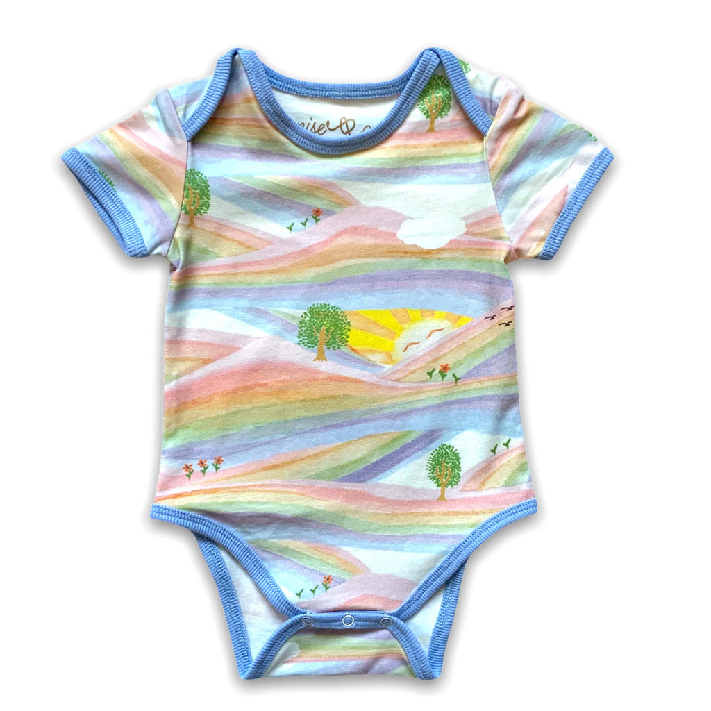 Anise & Ava genderless baby onesie body front in Sunray Rainbow with contrast ribbing and envelop neck for easy wearing. 