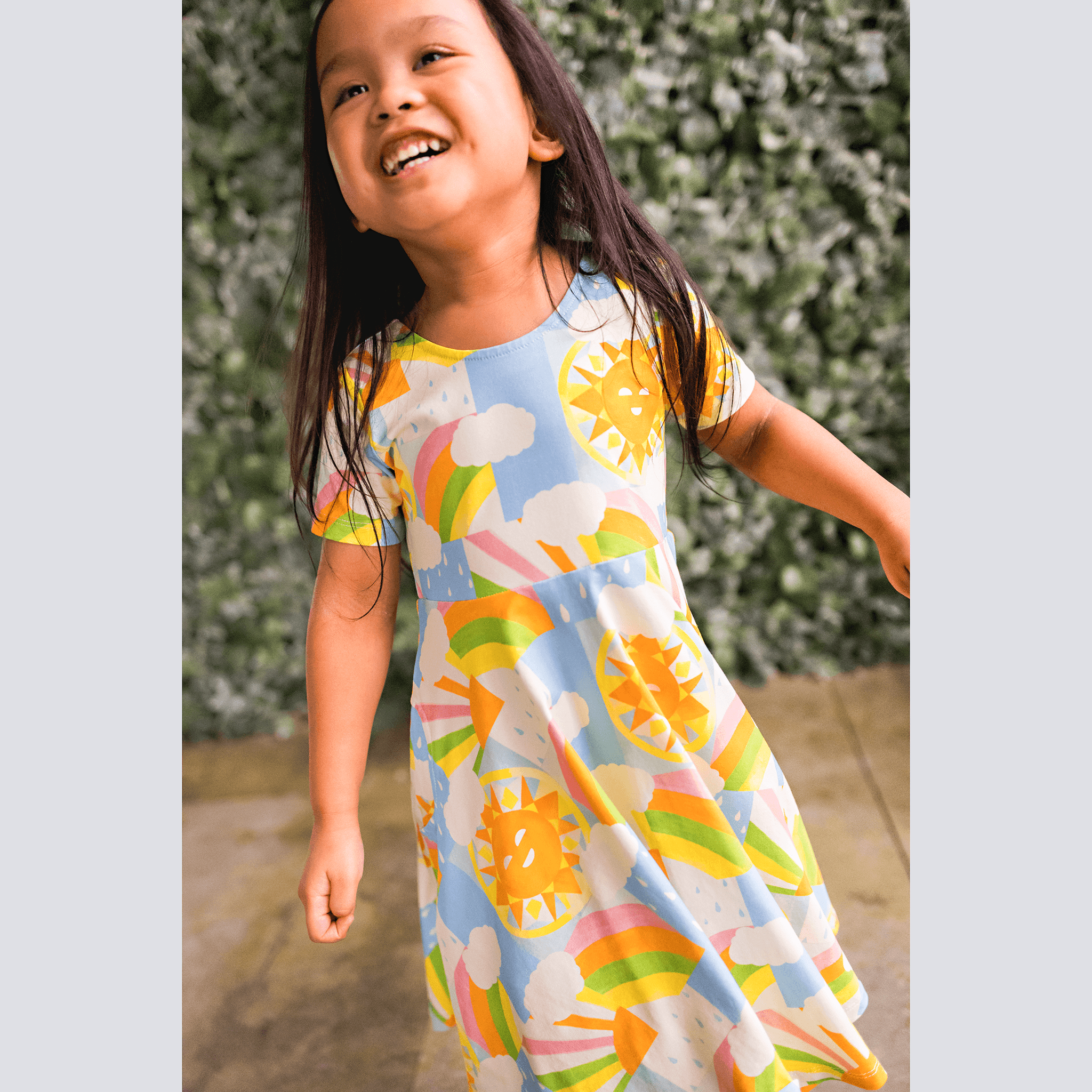 Anise & Ava exclusive hand drawn Sun print eco friendly printed on luxury stretch cotton. Designed and made to match siblings styles. Short sleeves Journey dress is Anise & Ava best selling style, made with deep pockets to hold all the treasures. Siblings matching styles are Brooklyn tee & Charlie baby dress. 