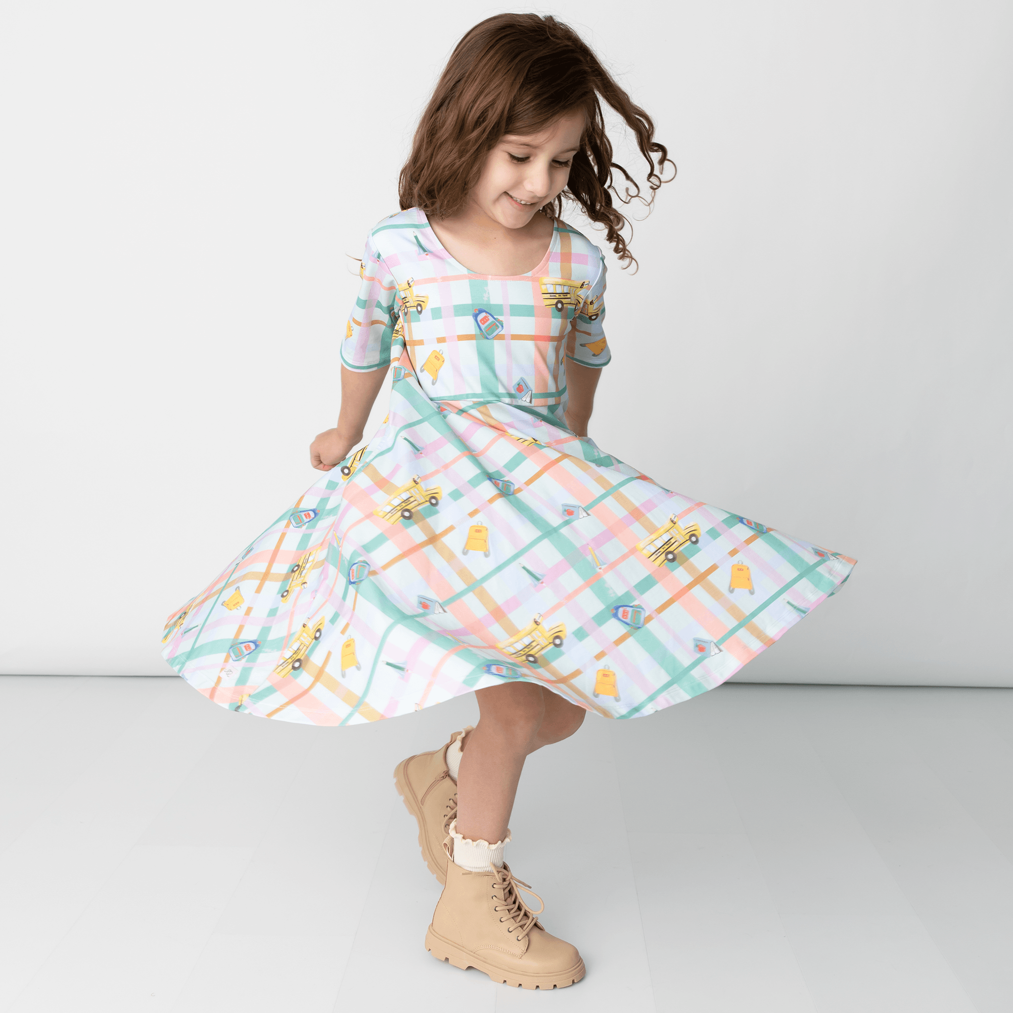 Anise & Ava exclusive genderless hand drawn art print all eco friendly printed on baby's and kids' core styles. Created to match. Our best seller dress has deep pockets on both sides for all those treasures collected along the way. 