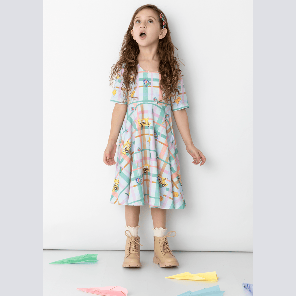 Anise & Ava exclusive genderless hand drawn art print all eco friendly printed on baby's and kids' core styles. Created to match. Our best seller dress has deep pockets on both sides for all those treasures collected along the way. 