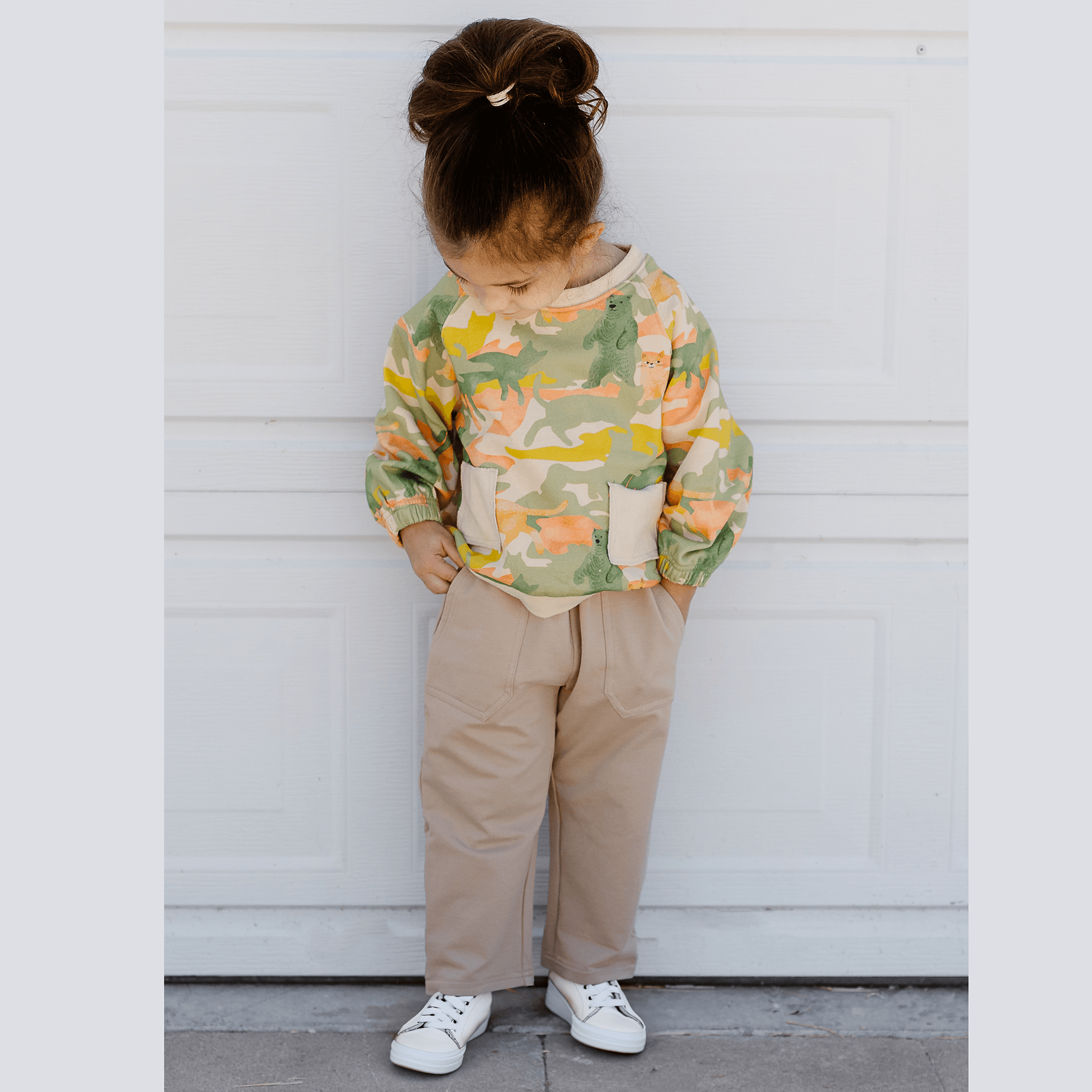 Anise & Ava's gender neutral exclusive printed sweatshirt paired with a Stone colored french terry jogger made for all babies & kids from 3months to 7/8 year olds. 