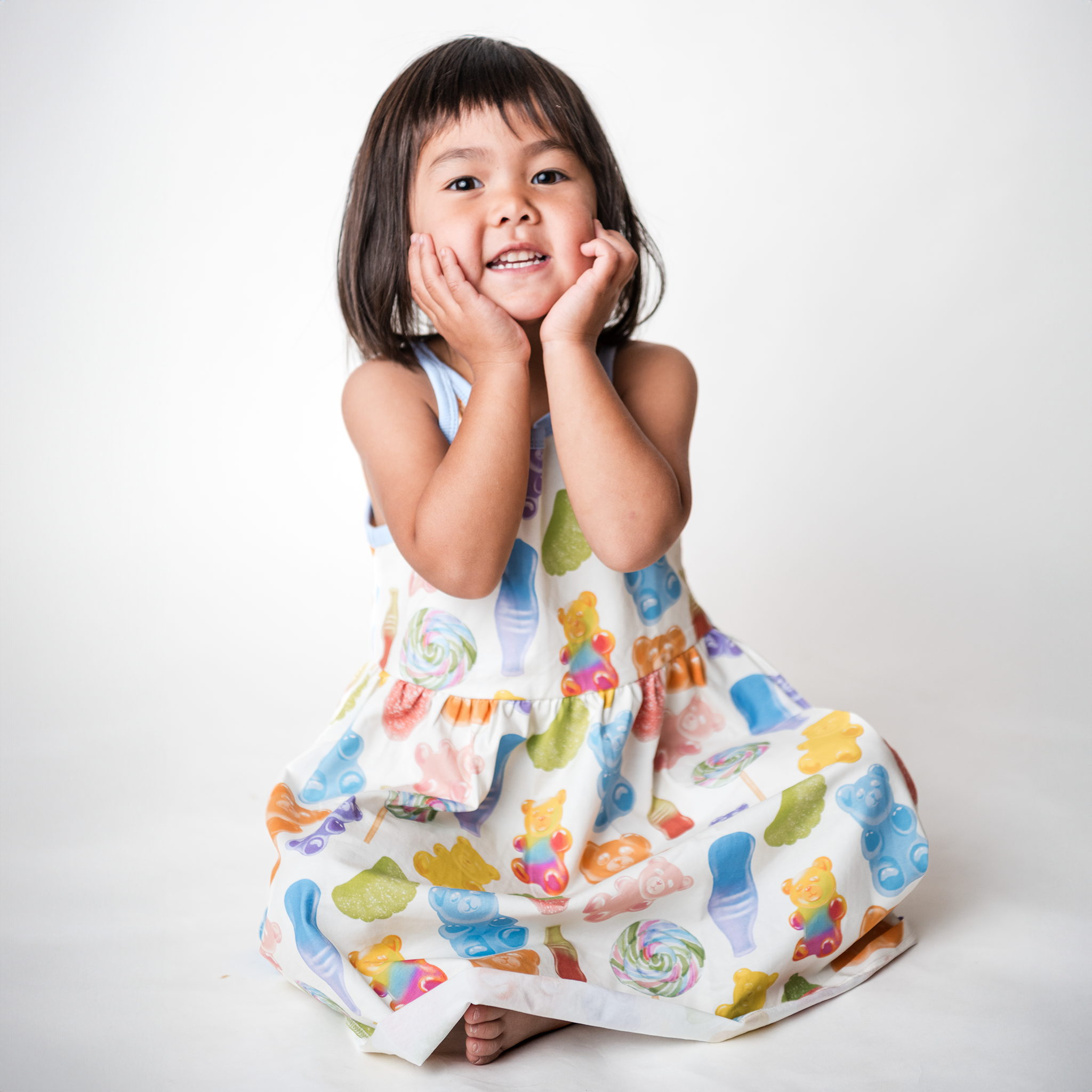 Anise & Ava's Sage dress in Gummy Bears for kids, designed with love in an exclusive hand drawn gender neutral colorful art, made to match siblings styles.