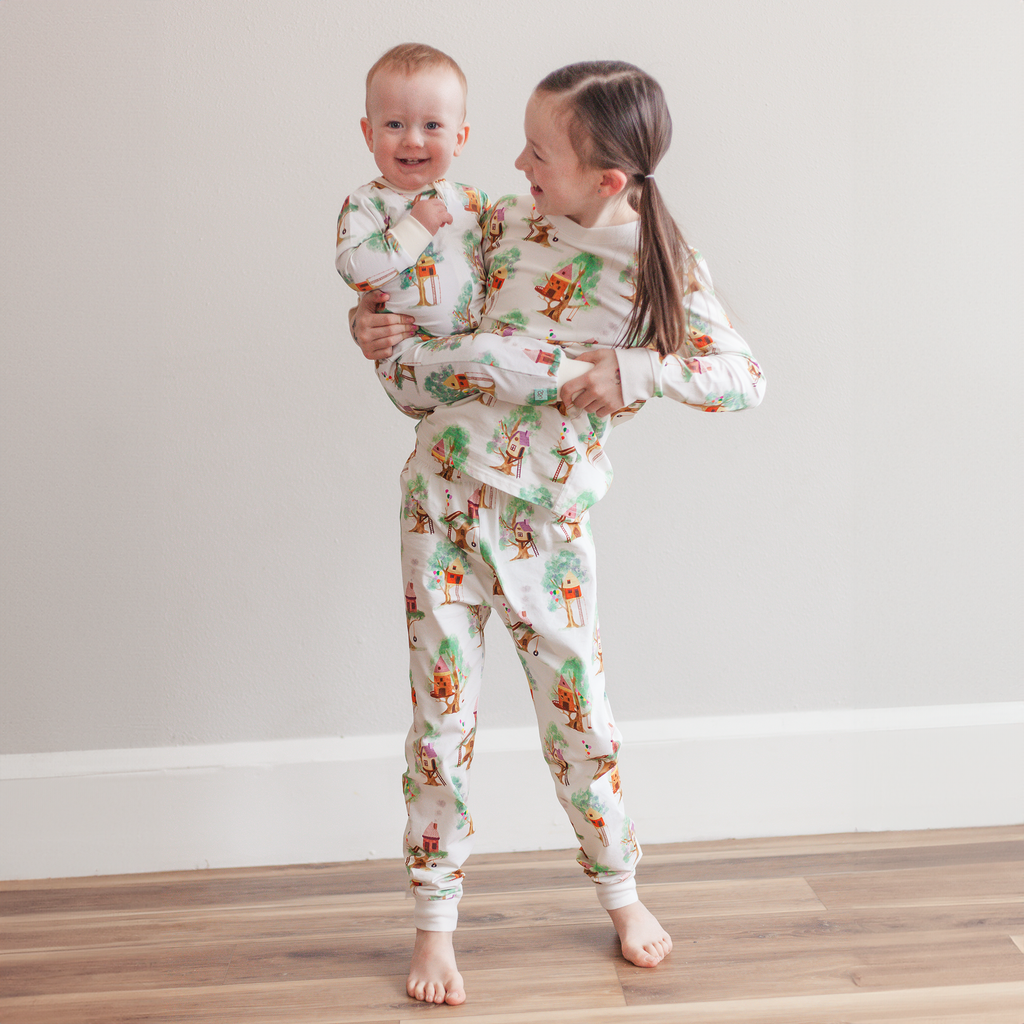 Anise & Ava's best selling baby's gift style designed and made in our exclusive hand drawn art print made to match siblings pajamas set. 