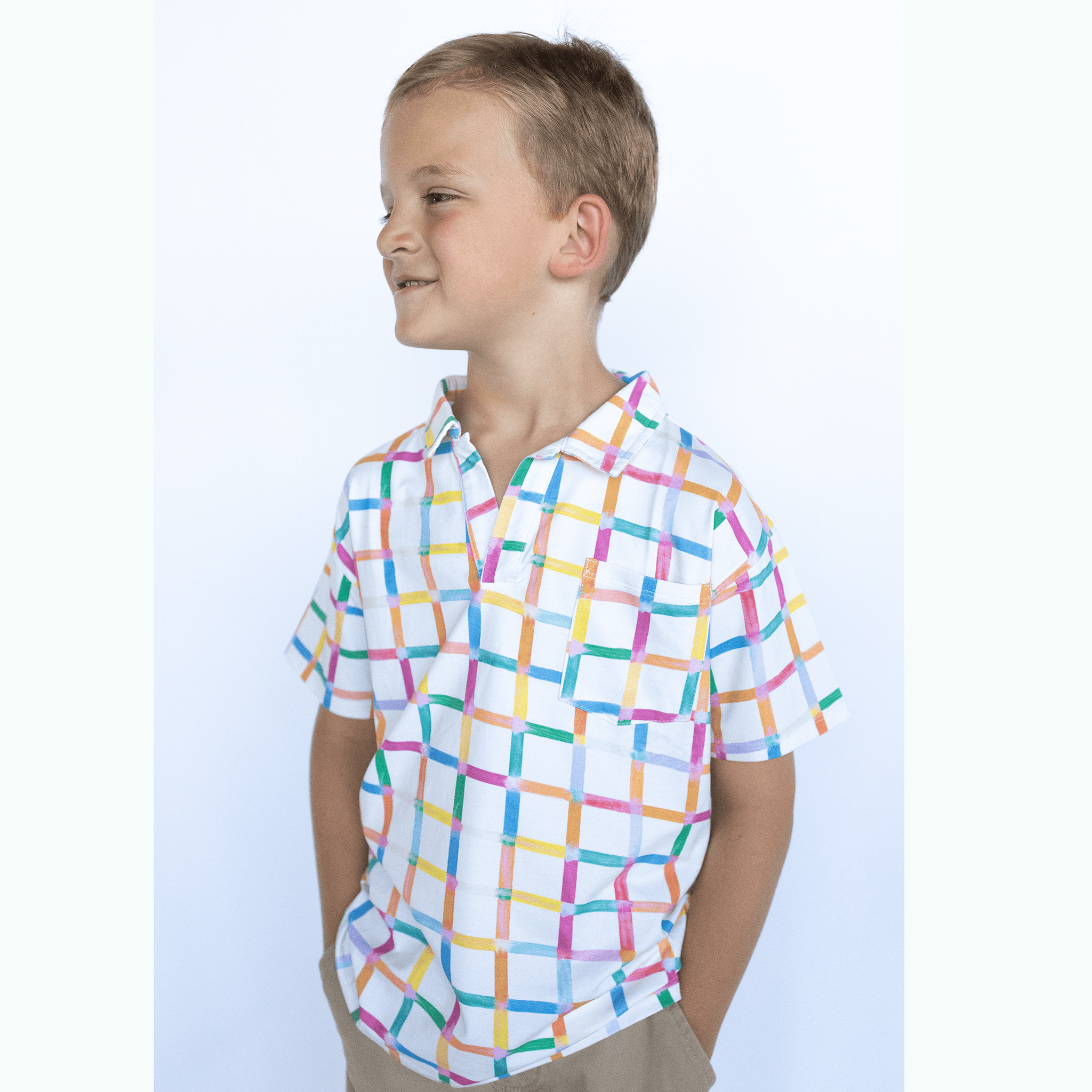 Anise & Ava exclusive hand drawn Grids print, eco friendly printed on luxury stretch cotton into our new point collar polo shirt. Designed and made to match siblings styles. Dress your family in this fun Summer exclusive print made for all boys & girls.