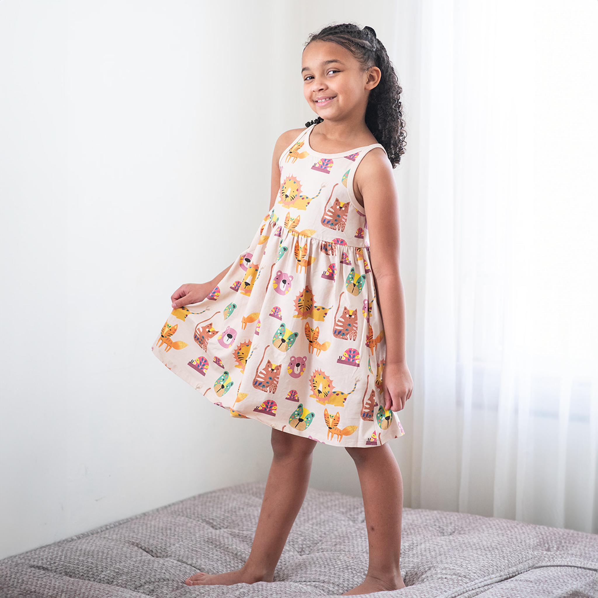 Anise & Ava's new Summer dress in forest friends, designed and made in an exclusive hand drawn art to match siblings' styles in babies and kids. 