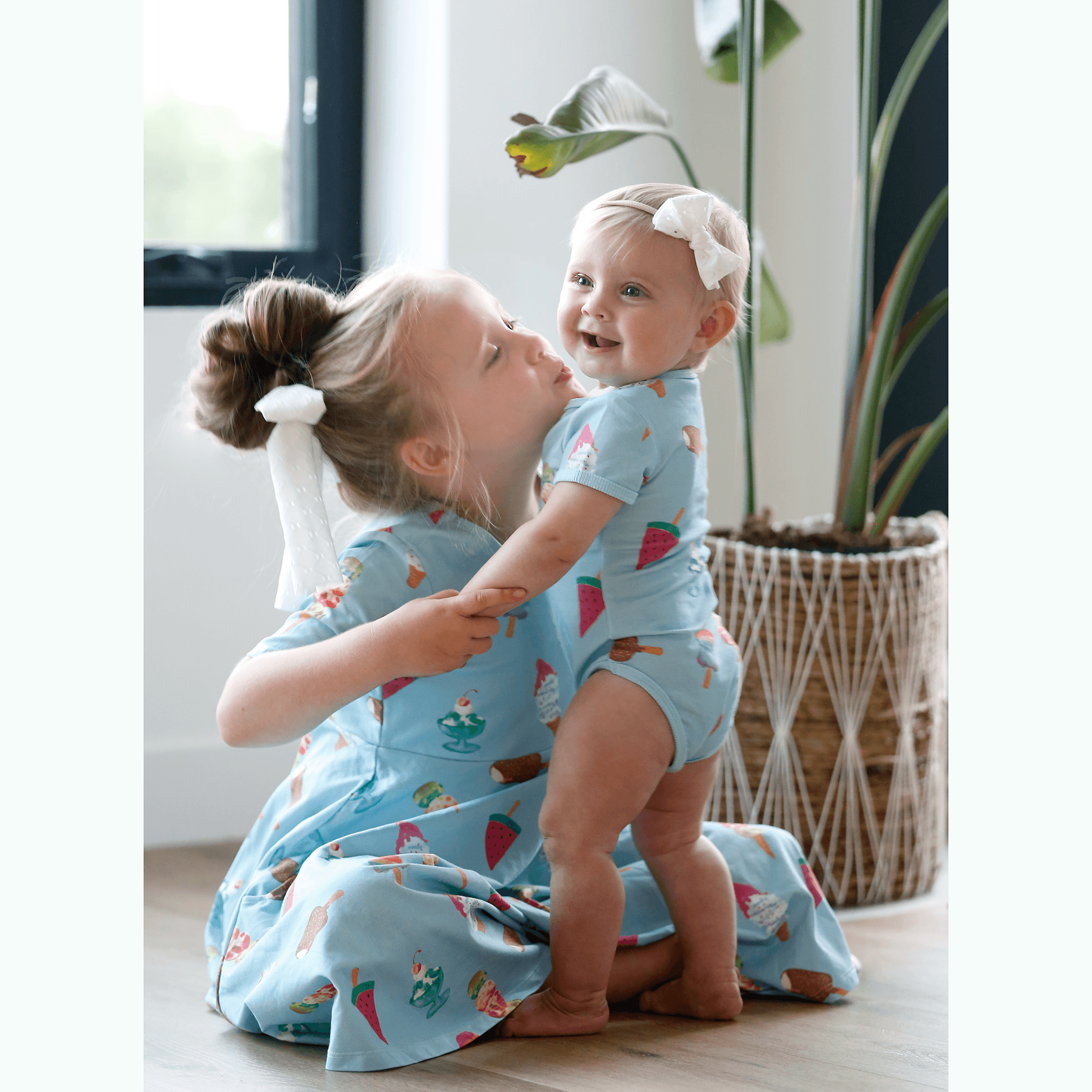 Anise & Ava exclusive hand drawn genderless Sundaes print eco friendly printed on luxury stretch cotton. Designed and made to match siblings styles. Short sleeves Journey dress is Anise & Ava best selling style, made with deep pockets to hold all the treasures. Siblings matching styles Wren baby body for both boys & girls. 