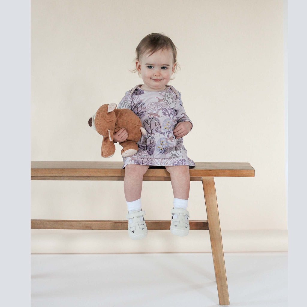 Anise & Ava's most loved baby onesie dress. Made to match with siblings' styles in our hand drawn gender neutral forest print, eco friendly printed onto our soft cotton. 