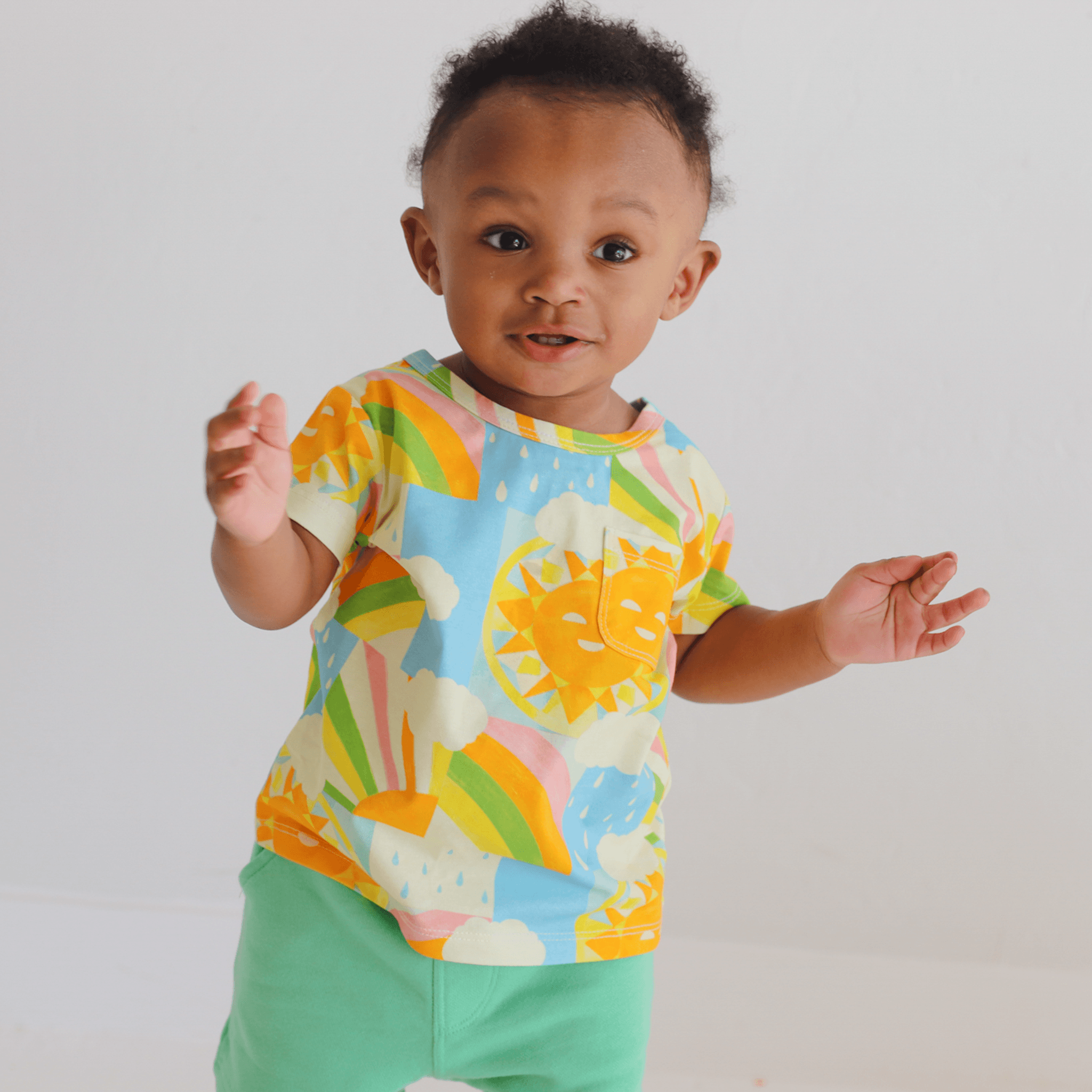 Anise & Ava exclusive hand drawn genderless Sun print, eco friendly printed on luxury stretch cotton into our best selling pocket tee. Designed and made to match siblings styles in Journey girls dresses, Charlie baby dress, and Clean baby romper. Dress your family in this happy exclusive print made for all boys & girls. 