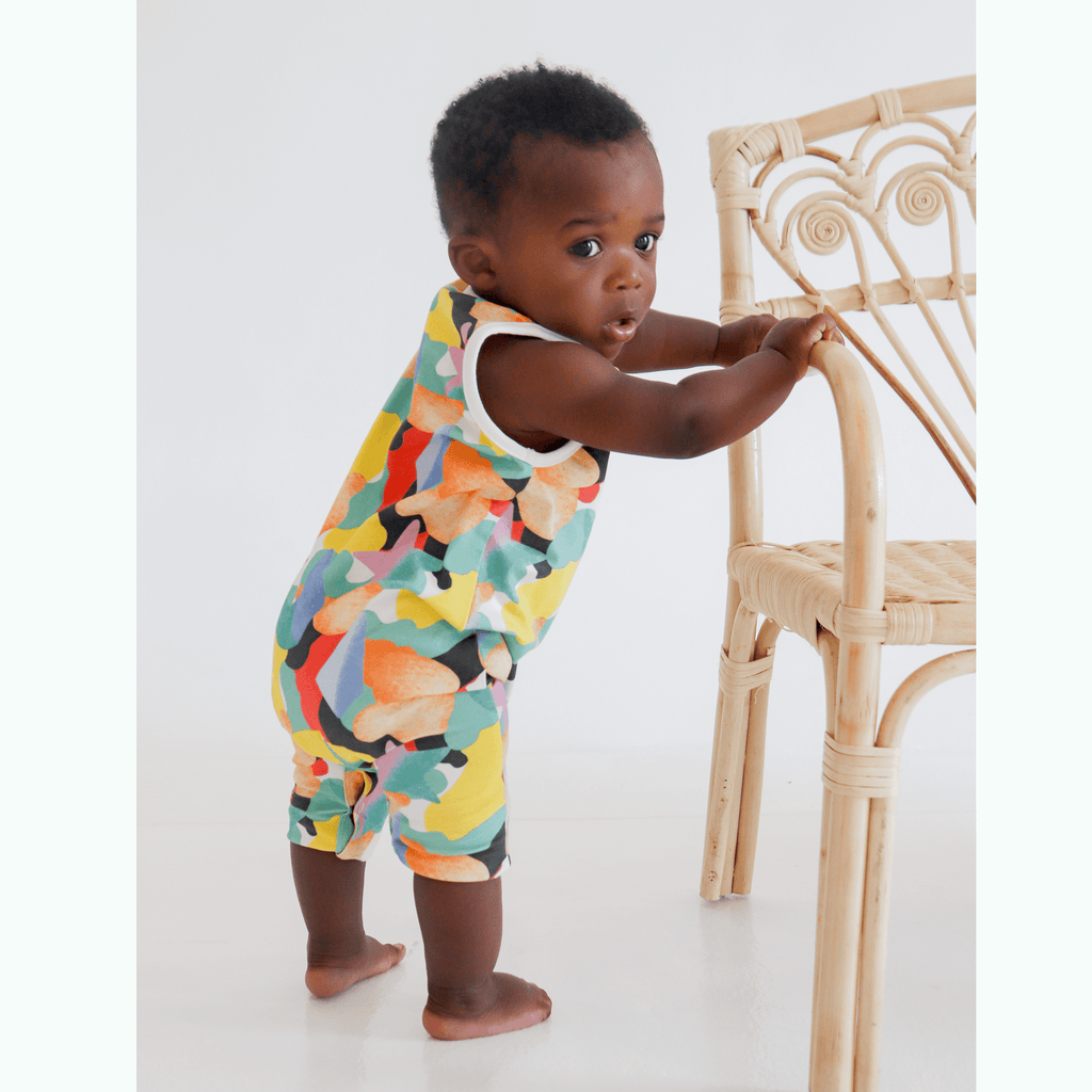 Anise & Ava exclusive hand drawn artwork eco friendly printed onto luxuy stretch cotton. Our one of a kind printed baby shorts romper is made to match siblings styles.