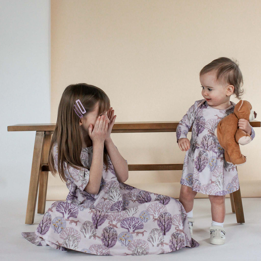 Anise & Ava's most loved baby onesie dress. Made to match with siblings' styles in our hand drawn gender neutral forest print, eco friendly printed onto our soft cotton. 