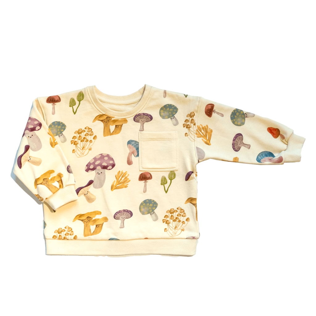 Anise & Ava genderless exclusive hand drawn mushrooms print, eco friendly printed on fabric. Made in a long sleeves most loved sweatshirt with dye to match ribbs pockets for babies to kids, boys & girls. 