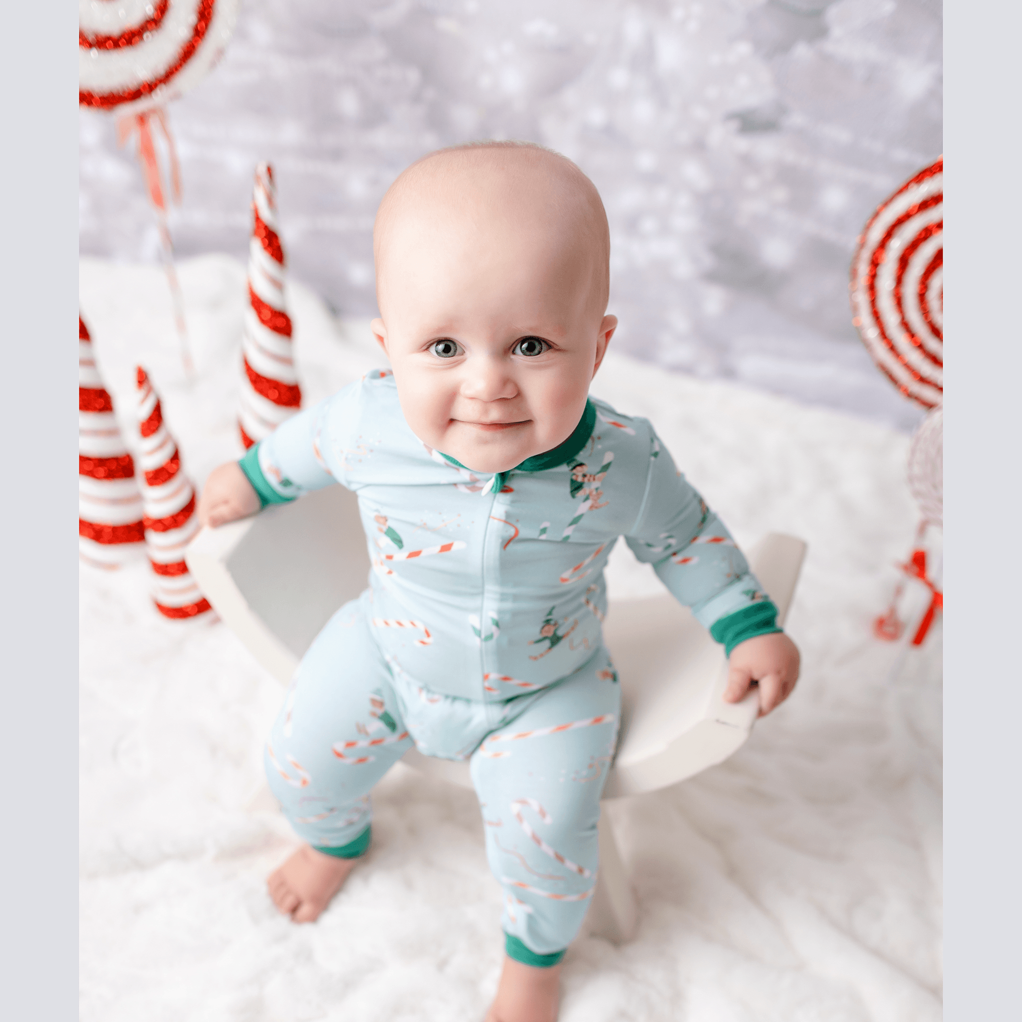 Anise & Ava Holiday baby pajamas in an exclusive hand drawn original art. Genderless print for all baby boys & girls, eco friendly printed, to match siblings' 2 pieces pajamas.