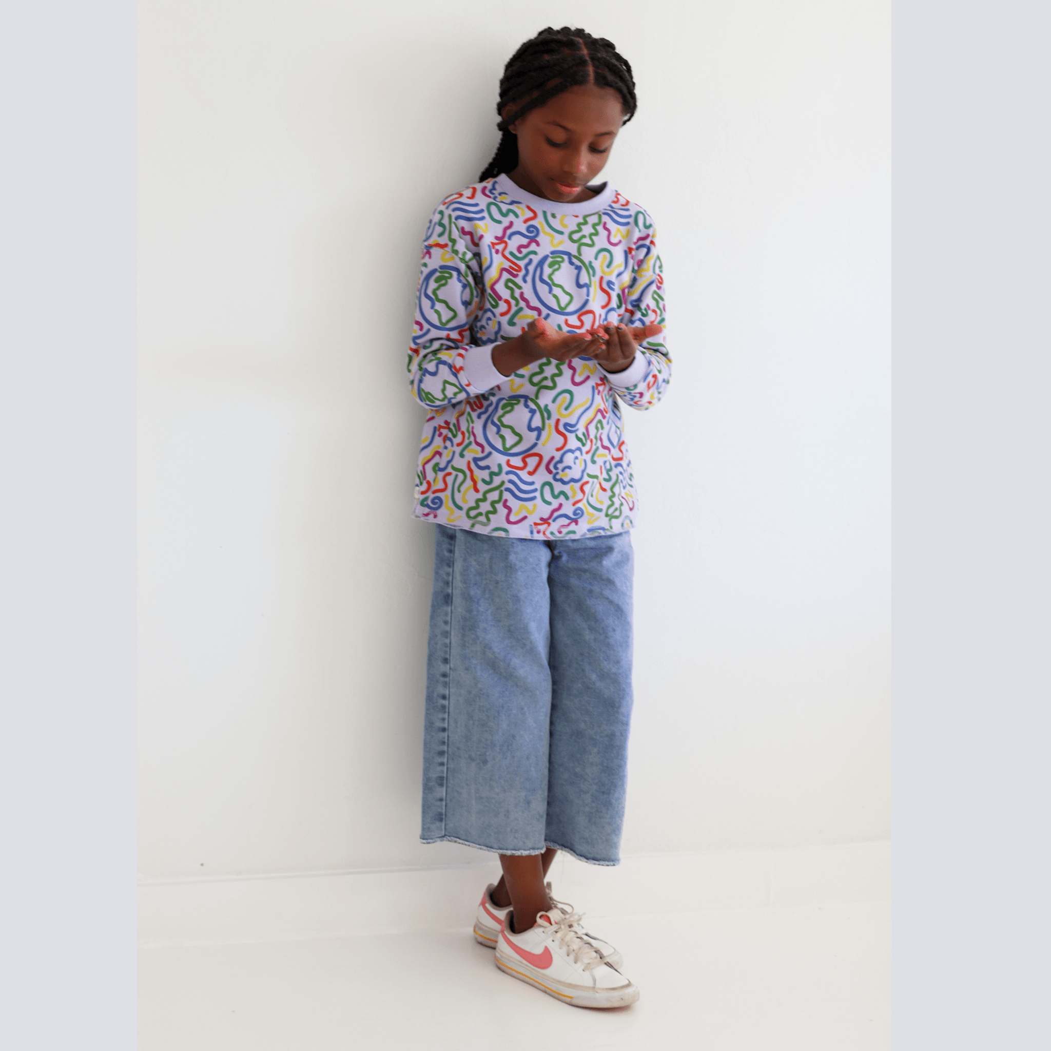 Anise & Ava's gender neutral exclusive hand drawn artwork eco friendly printed on a all cotton fleece. Made to match baby sibling's onesie. Perfect cozy pullover for the winter with a burst of color and inspiring art. 