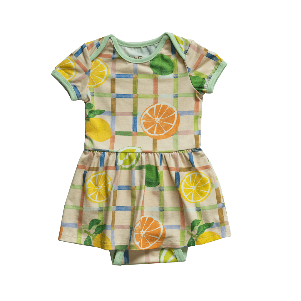 Anise & Ava exclusive hand drawn print in Citrus, eco friendly printed on a stretch luxury cotton for baby. Designed and made to match siblings styles in kids. 