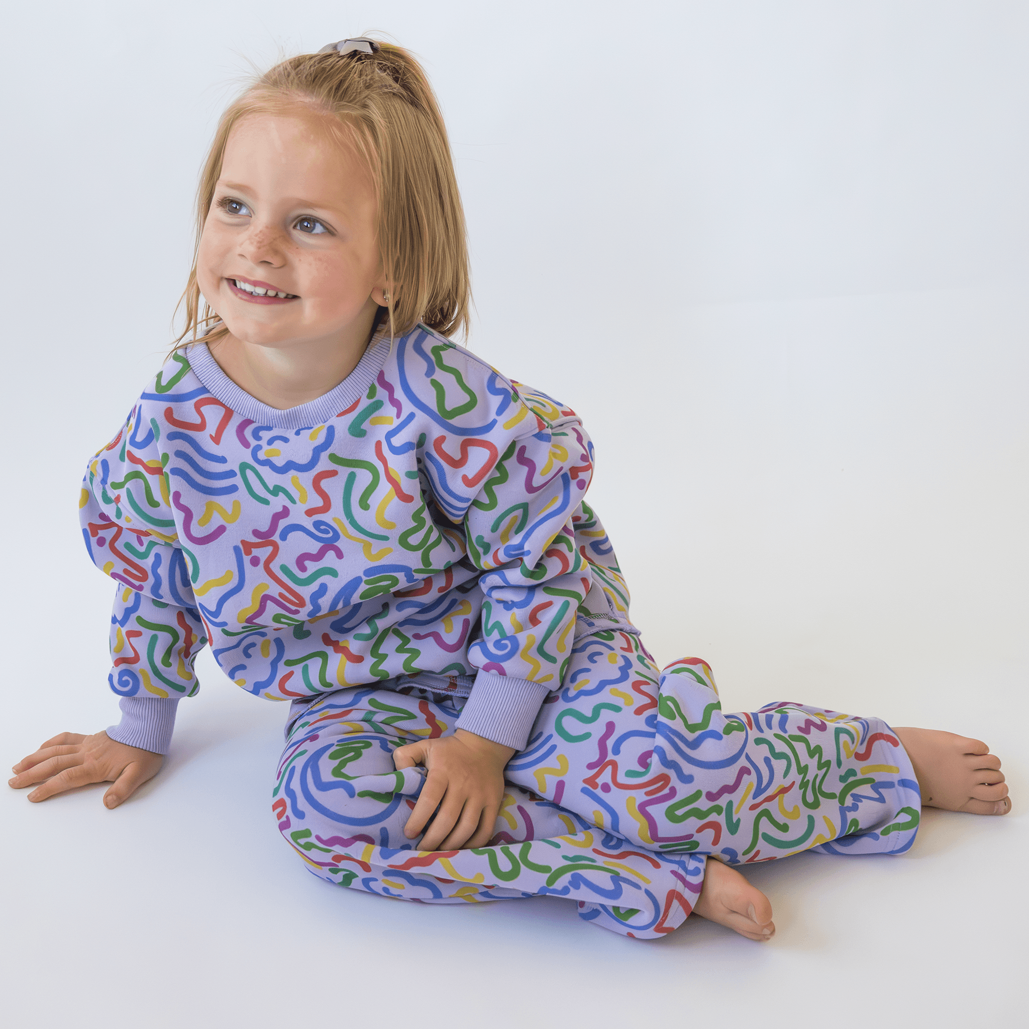 Anise & Ava's gender neutral exclusive hand drawn artwork eco friendly printed on a all cotton fleece. Made to match baby sibling's onesie. Perfect cozy pullover for the winter with a burst of color and inspiring art. 