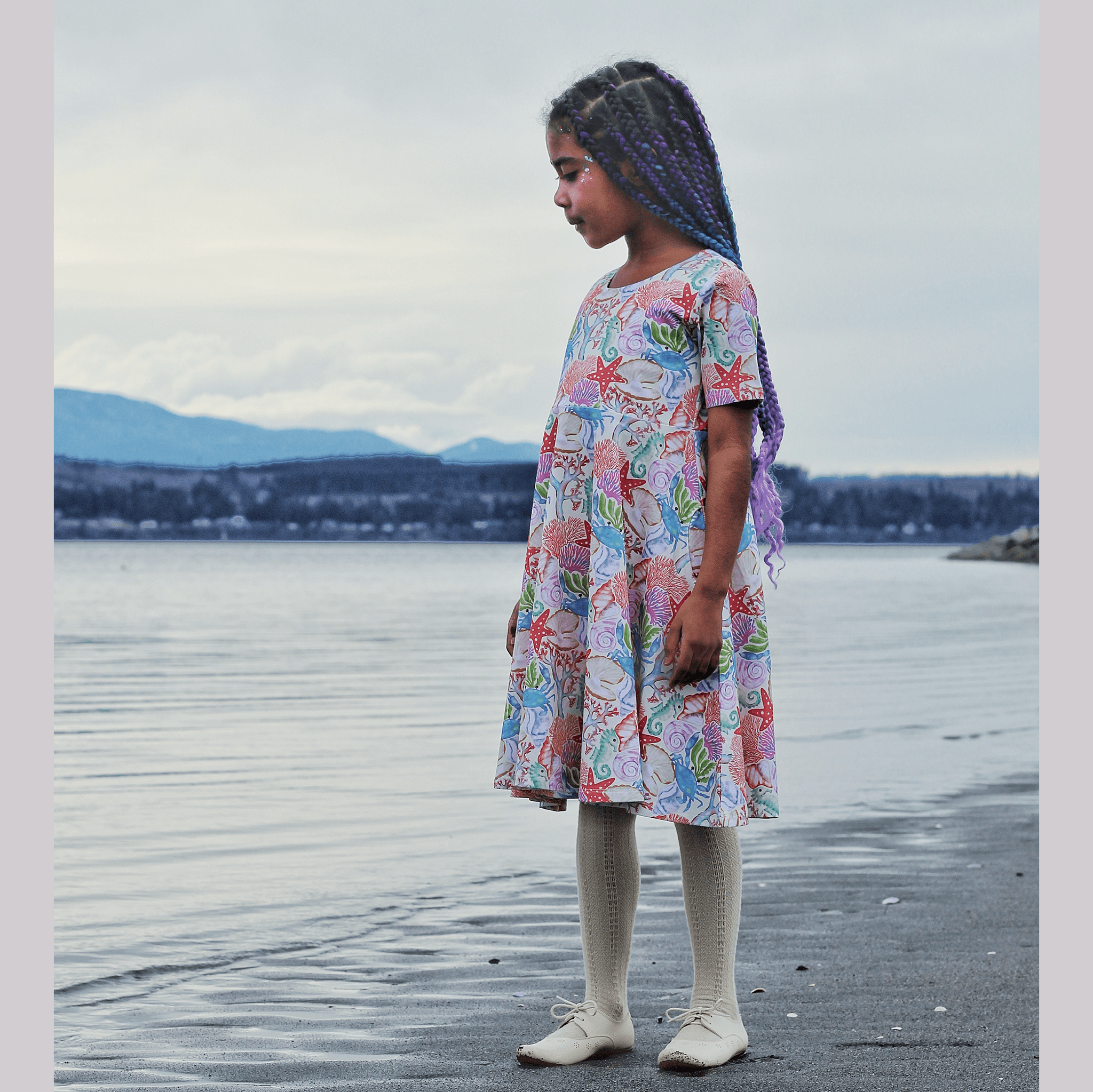 Anise & Ava genderless hand drawn exclusive artwork, eco friendly printed on luxury cotton. Anise & Ava short sleeves pocketed twirl full circle dress, designed to match with siblings' styles, baby onesies, body, and kids' tee and shorts.