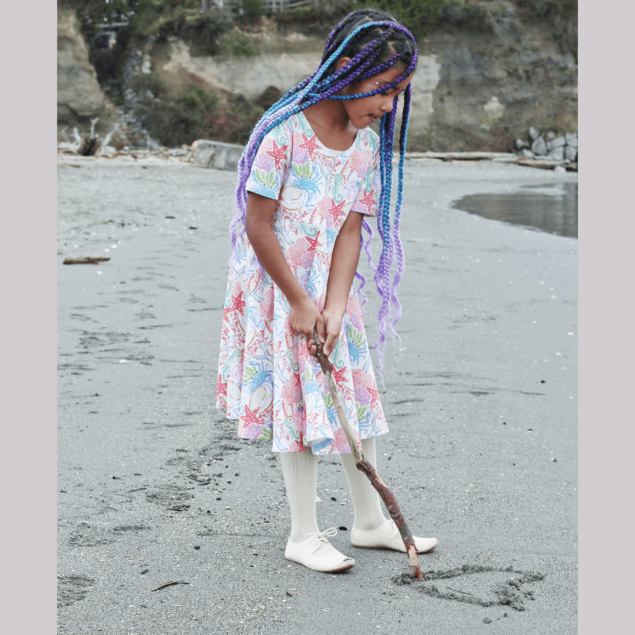 Anise & Ava genderless hand drawn exclusive artwork, eco friendly printed on luxury cotton. Anise & Ava short sleeves pocketed twirl full circle dress, designed to match with siblings' styles, baby onesies, body, and kids' tee and shorts.