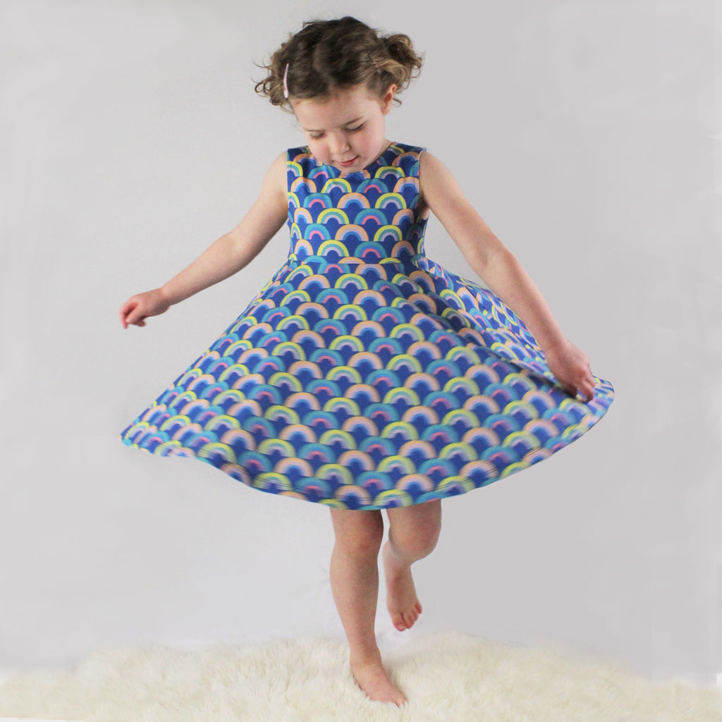 Girls' knit swirl dress front in Rainbow print, gender neutral fun print to match with Mommy & me, daddy & me, and siblings' outfits, by Anise & Ava.