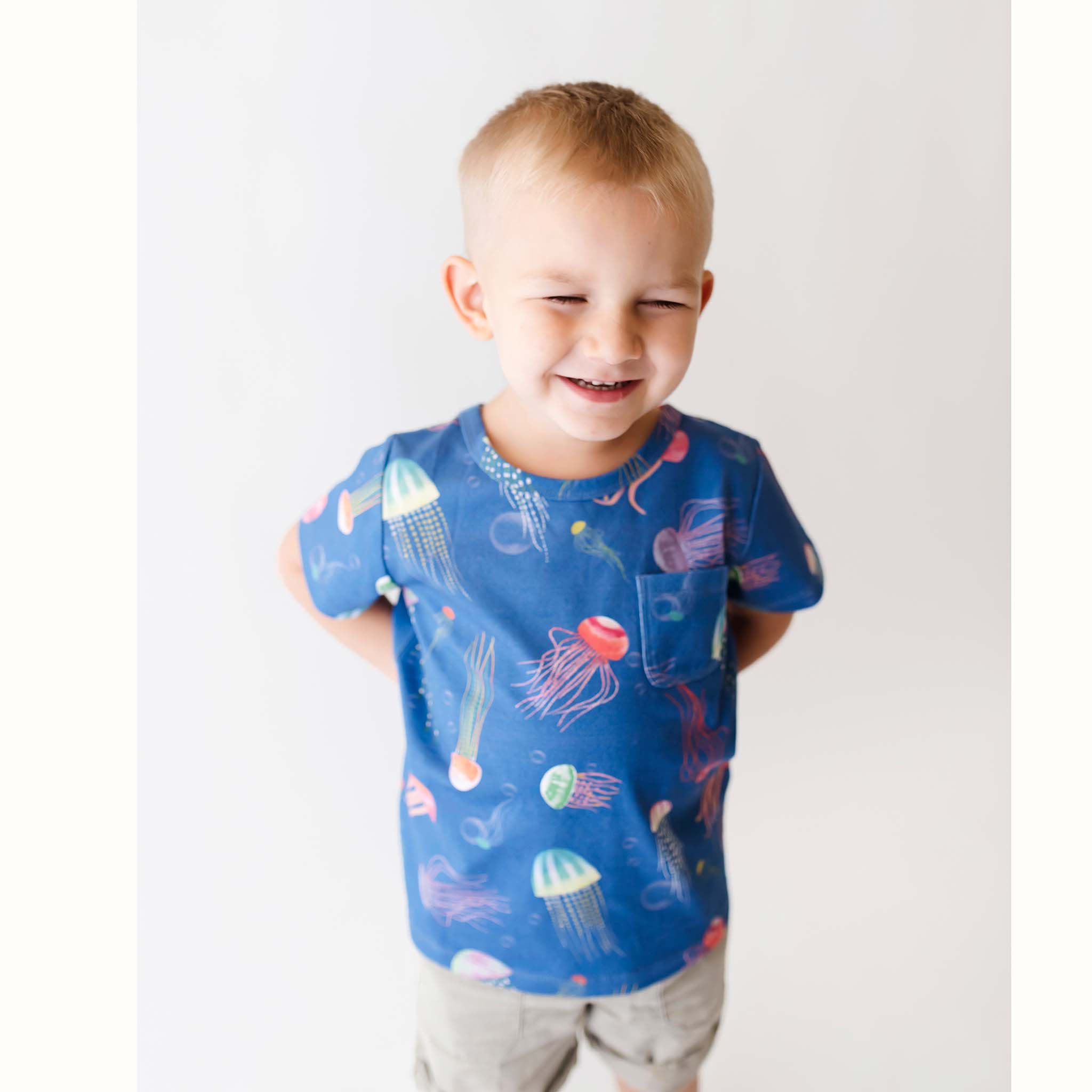 Anise & Ava genderless hand drawn exclusive artwork eco friendly printed on luxury cotton. Anise & Ava short sleeves pocket tee made to match with siblings' styles of baby romper, baby onesie, and kids' dresses or shorts. 