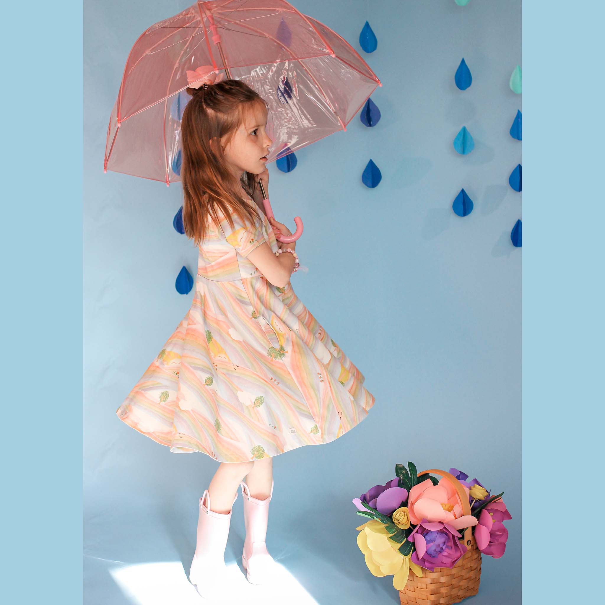 Anise & Ava genderless printed luxury cotton twirl dress with pockets FRONT in print Sunray Rainbow. Made to twin and match with other siblings. 