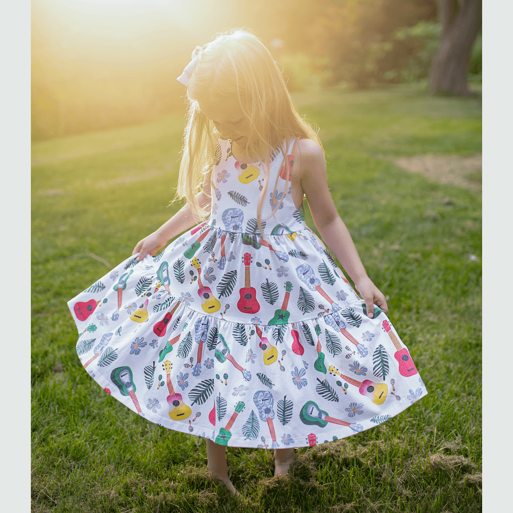 Anise & Ava genderless hand drawn exclusive art, eco friendly printed on luxury cotton. Anise & Ava sleeveless racer back dress, designed and made to match siblings' styles of baby onesies, dresses, tees, and shorts. 