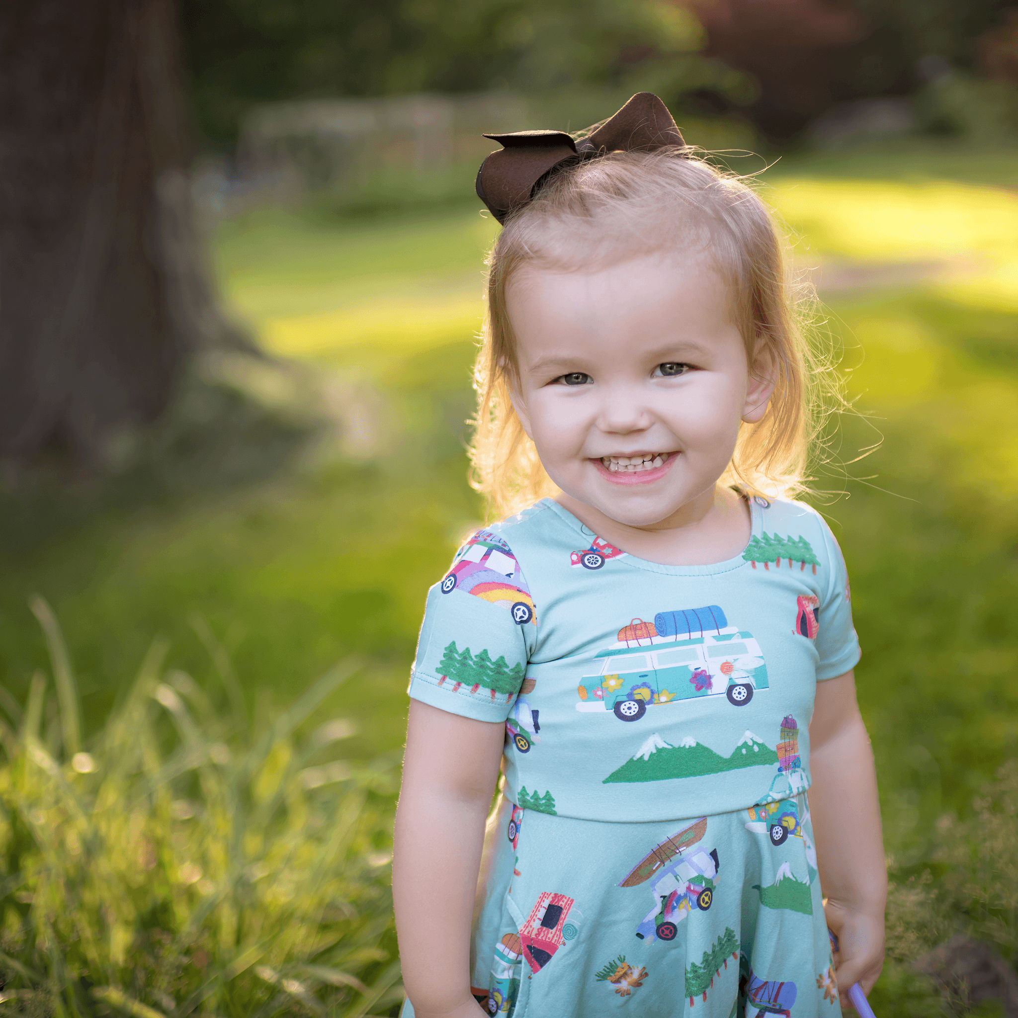 Anise & Ava genderless hand drawn exclusive artwork, eco friendly printed on luxury cotton. Anise & Ava short sleeves pocketed twirl full circle dress, designed to match with siblings' styles, baby onesies, body, and kids' tee and shorts. 