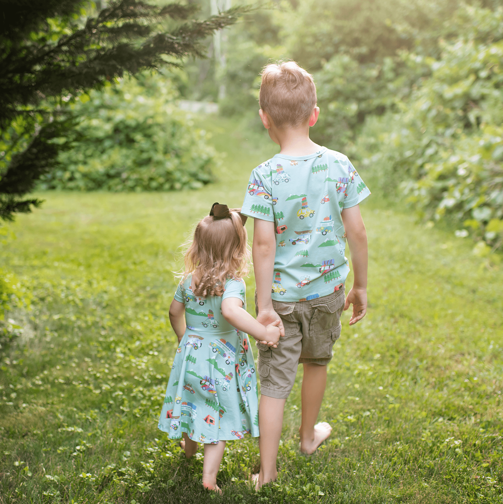 Anise & Ava genderless hand drawn exclusive artwork, eco friendly printed on luxury cotton. Anise & Ava short sleeves pocketed twirl full circle dress, designed to match with siblings' styles, baby onesies, body, and kids' tee and shorts. 