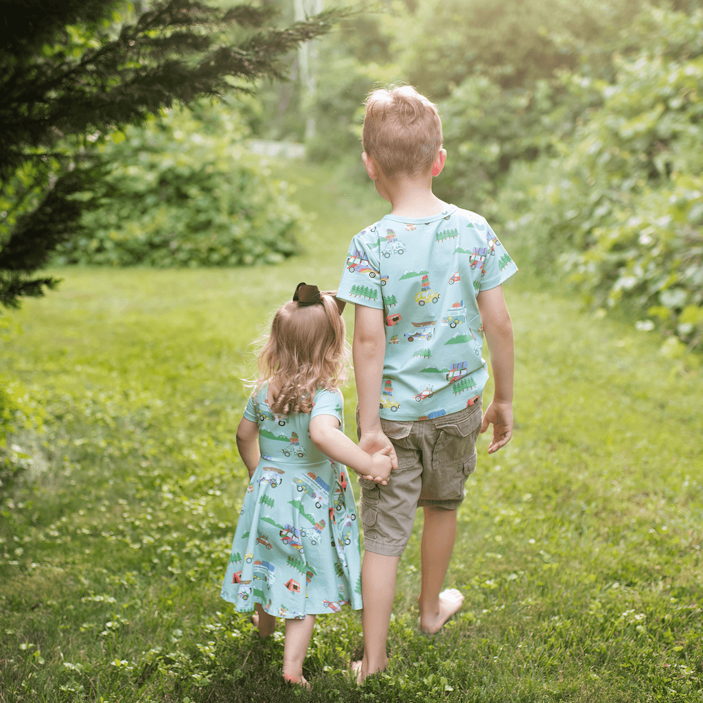 Anise & Ava genderless hand drawn exclusive artwork, eco friendly printed on luxury cotton. Anise & Ava short sleeves pocketed twirl full circle dress, designed to match with siblings' styles, baby onesies, body, and kids' tee and shorts. 