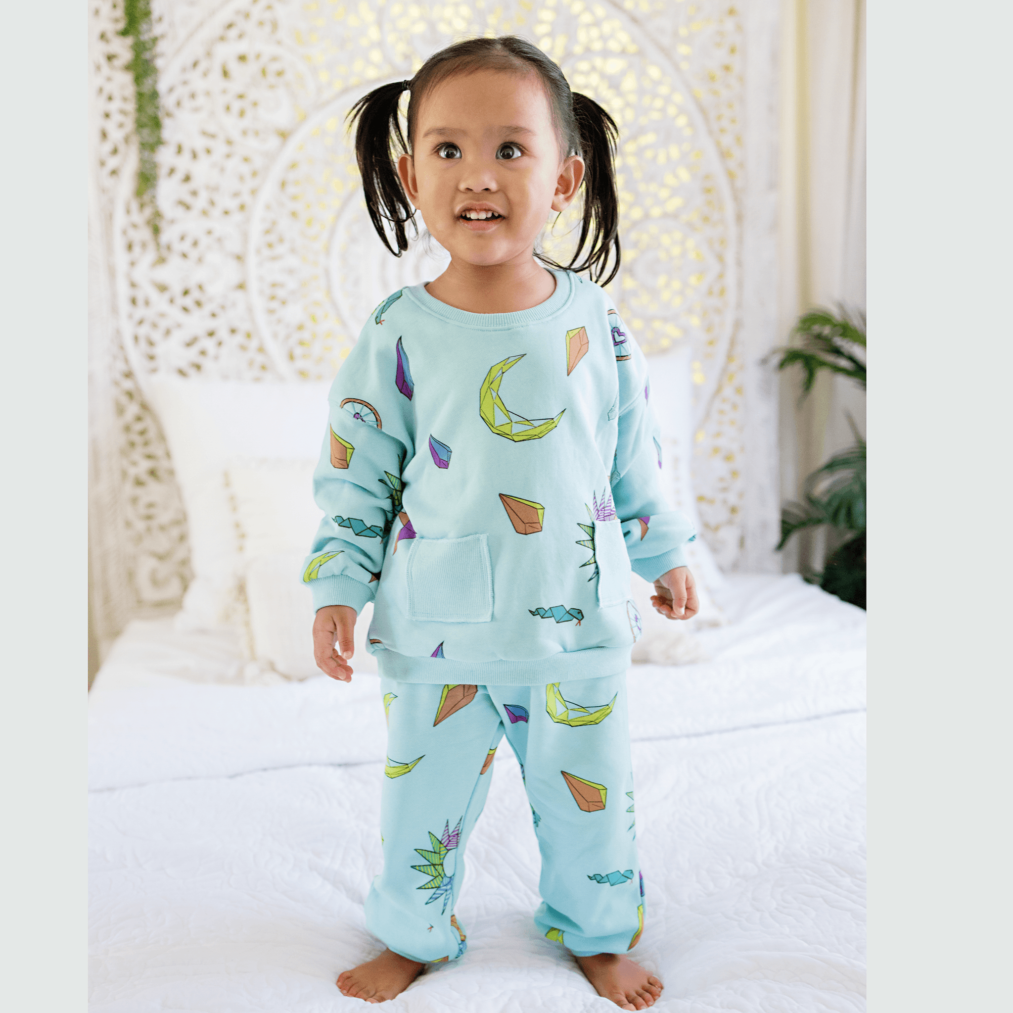 Anise & Ava gender neutral hand drawn art "Charmed" eco friendly printed onto cotton terry kids' long sleeves top with pockets. Made with love and made to match siblings. Top with pockets has a matching pant also made with 2 pockets for all the treasures found along adventures and can wear as a set. 