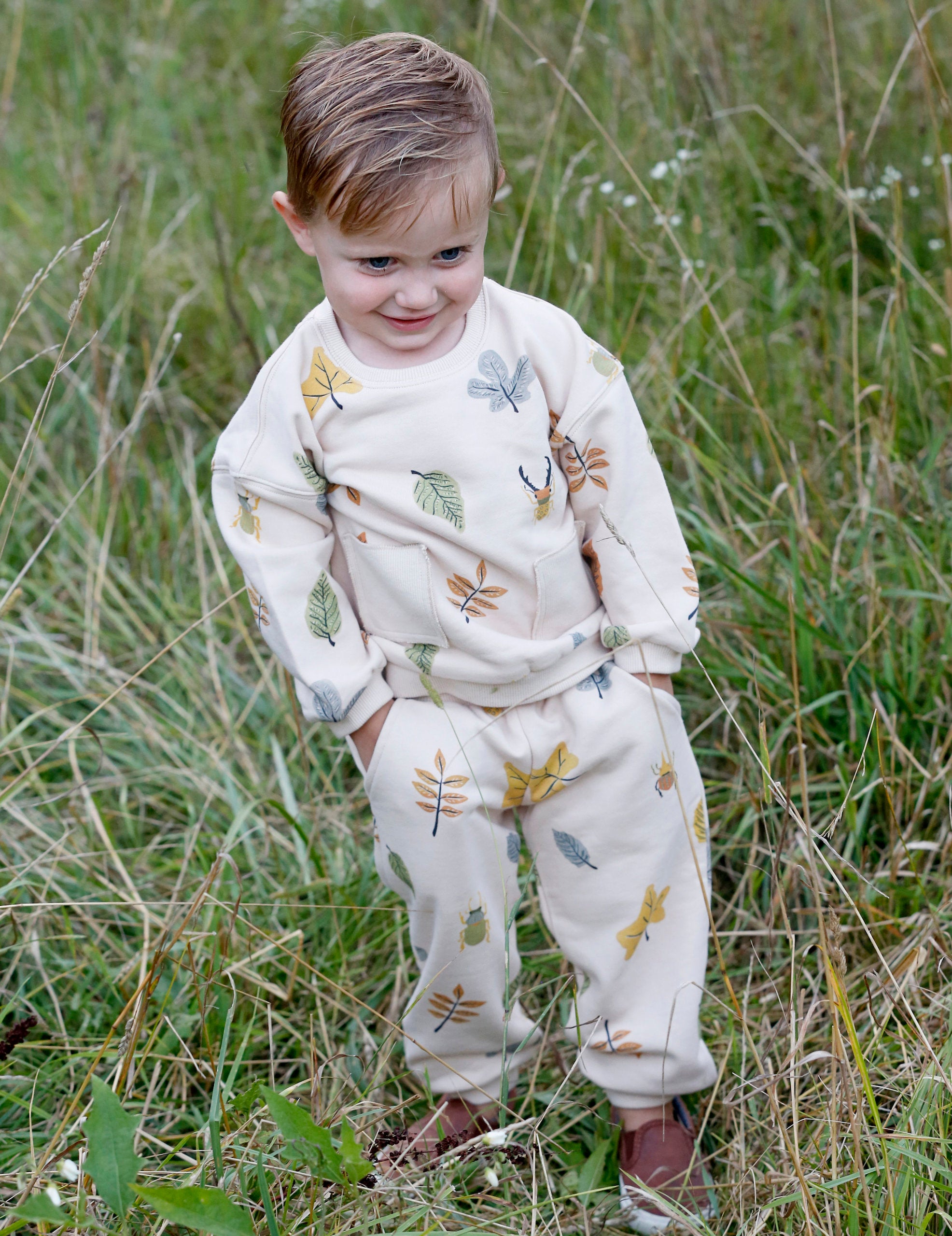 Anise & Ava gender neutral hand drawn art eco friendly printed onto cotton terry kids' pants with pockets. Made with love and made to match siblings. Bottom has a matching top also made with 2 pockets for all the treasures found along adventures. 