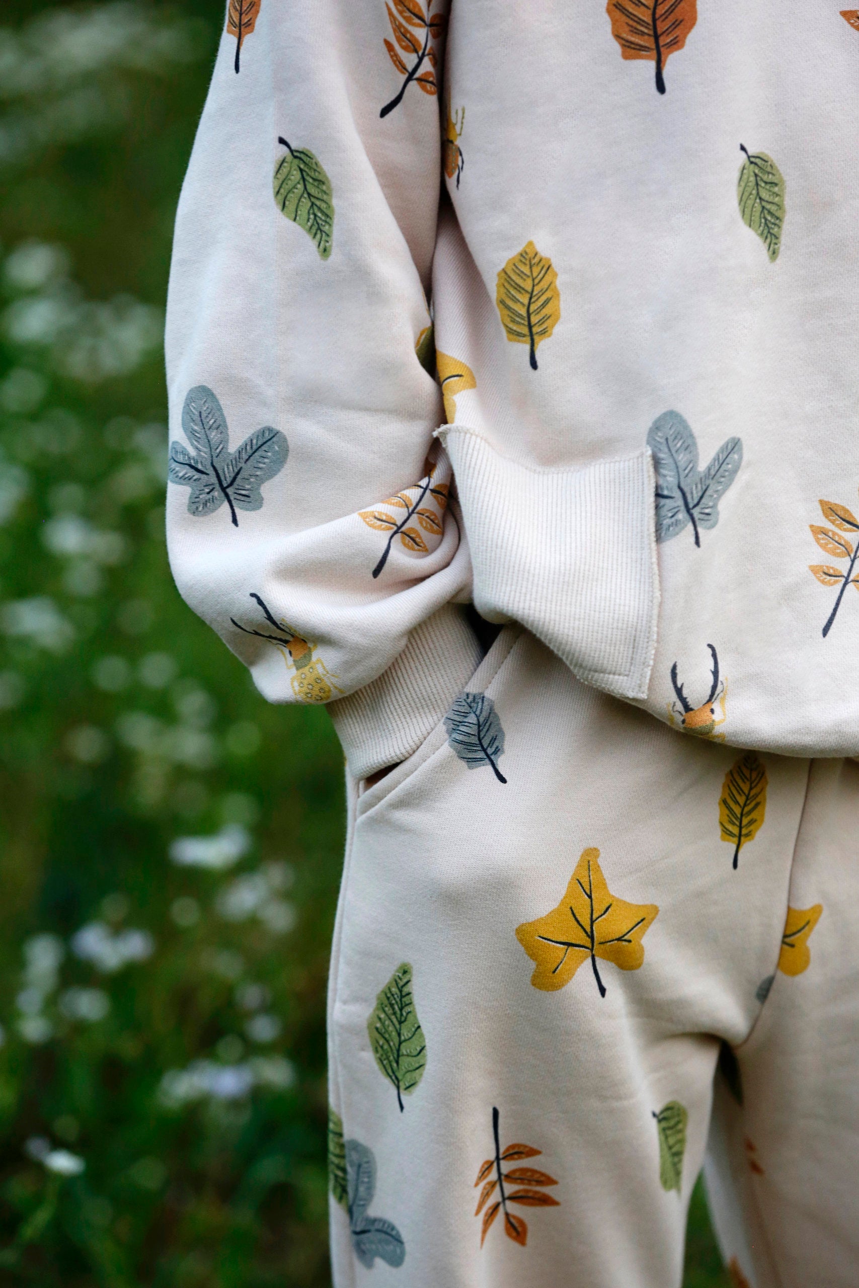 Anise & Ava gender neutral hand drawn art eco friendly printed onto cotton terry kids' pants with pockets. Made with love and made to match siblings. Bottom has a matching top also made with 2 pockets for all the treasures found along adventures. 