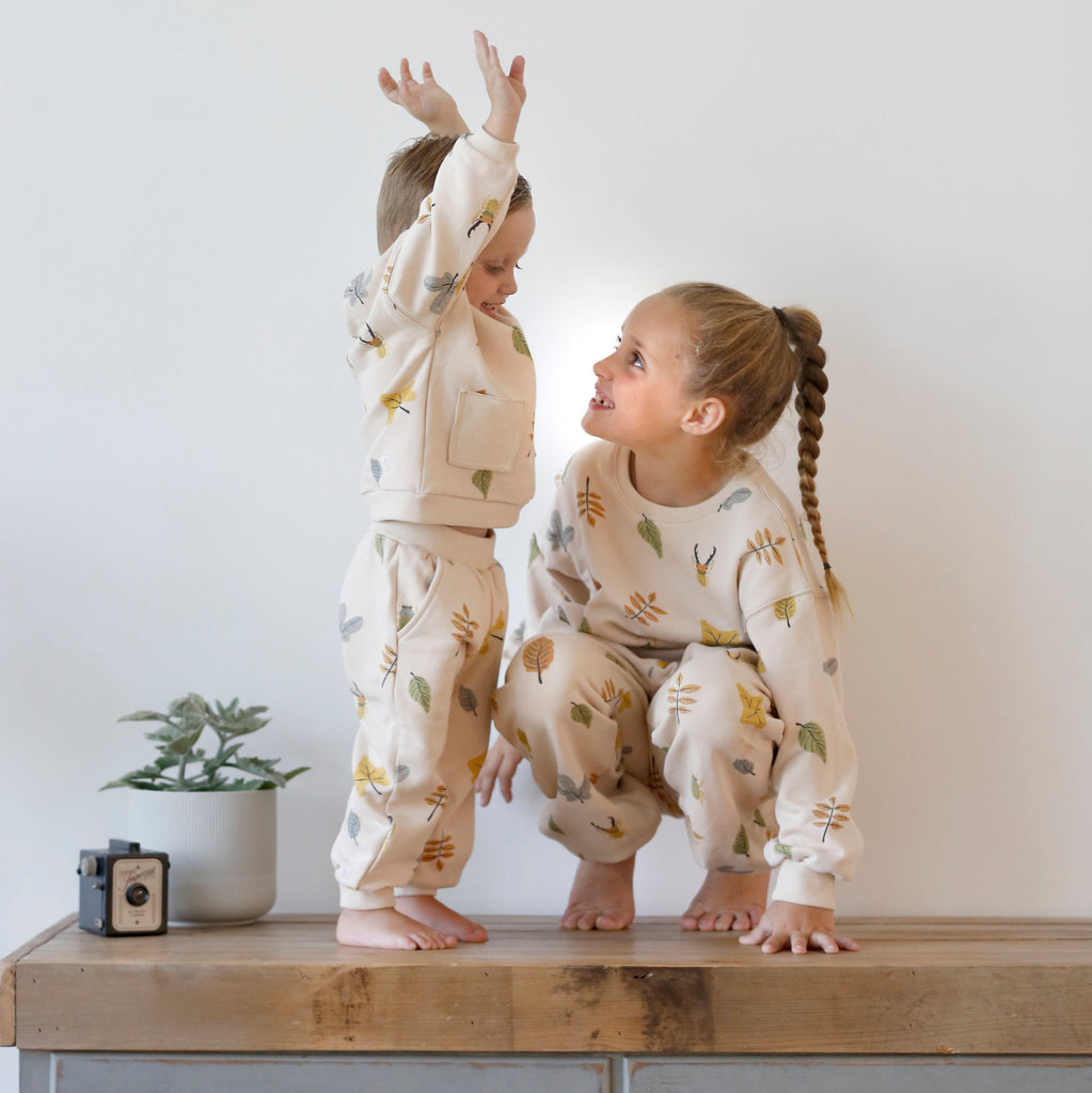 Anise & Ava gender neutral hand drawn art eco friendly printed onto cotton terry kids' pants with pockets. Made with love and made to match siblings. Bottom has a matching top also made with 2 pockets for all the treasures found along adventures. 