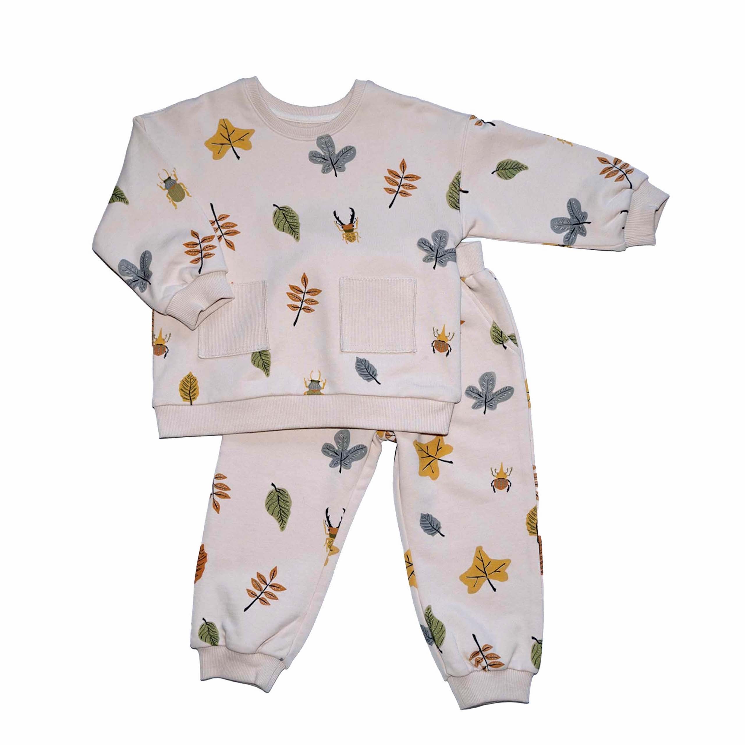 Anise & Ava gender fluid colorful hand drawn prints eco friendly printed onto Cotton terry sweatshirt. Sweatshirt has front ribbed pockets dyed to match  to ground color. Made to match with siblings. 