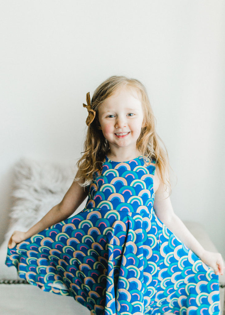 Girls' knit swirl dress front in Rainbow print, to match with Mommy & me, daddy & me, and siblings' outfits by Anise & Ava.