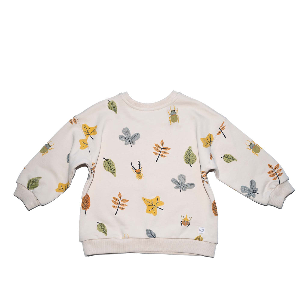 Anise & Ava gender fluid colorful hand drawn prints eco friendly printed onto Cotton terry sweatshirt. Sweatshirt has front ribbed pockets dyed to match  to ground color. Made to match with siblings. 