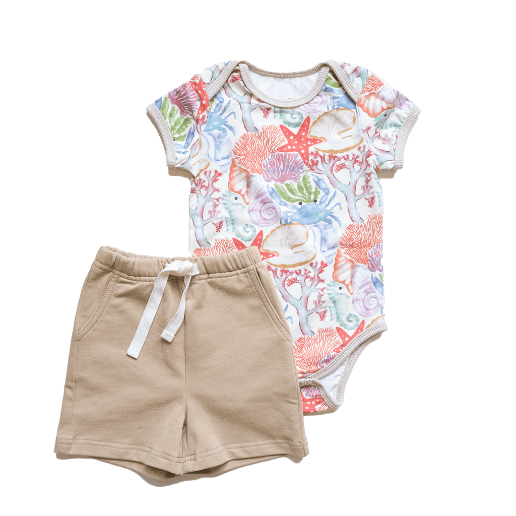 Anise & Ava handdrawn exclusive art, Ocean Puzzle, eco friendly printed on fine luxury cotton baby snap body.  Made with love to match siblings styles in tops and  dresses. 