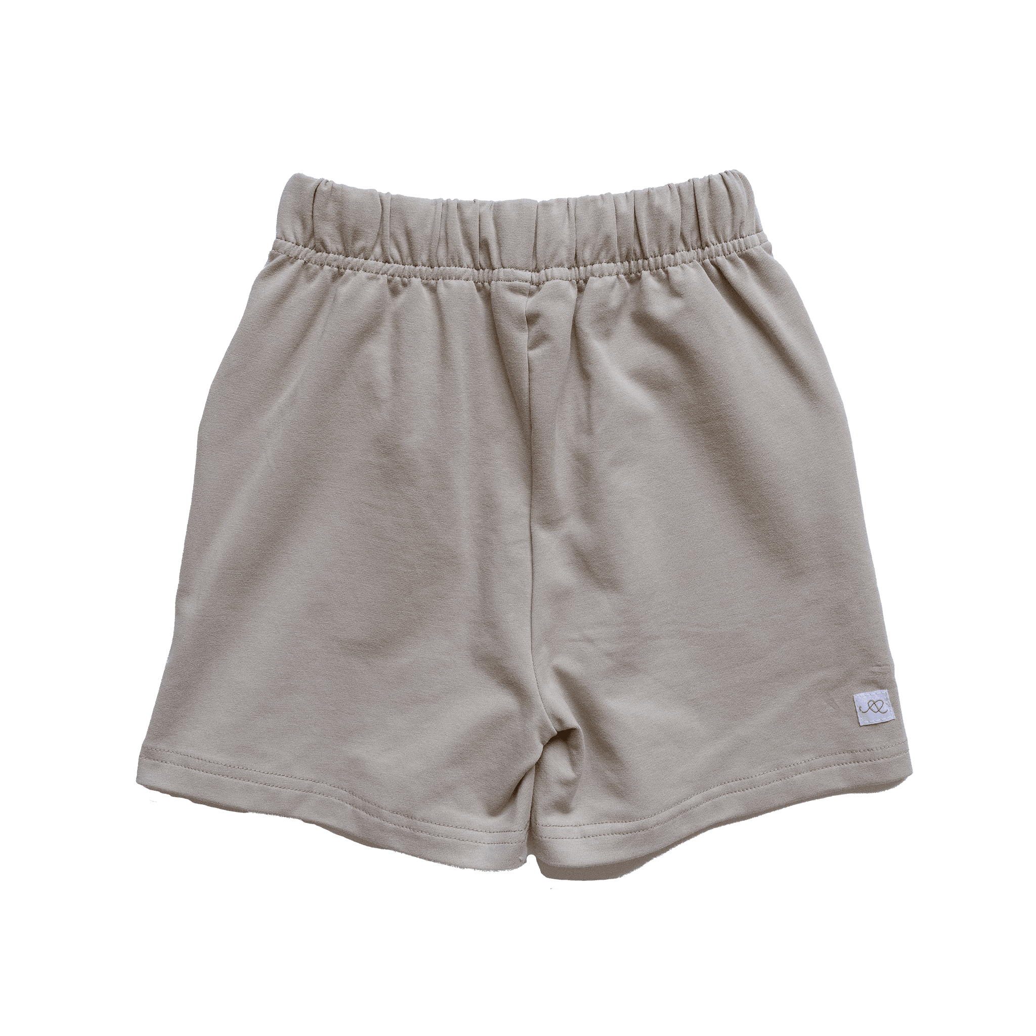 Anise & Ava genderless stretch cotton terry shorts in Stone color. Made for all boys & girls with a longer inseam for tumbling all day long. Shorts available for babies to 7/8 year old. 