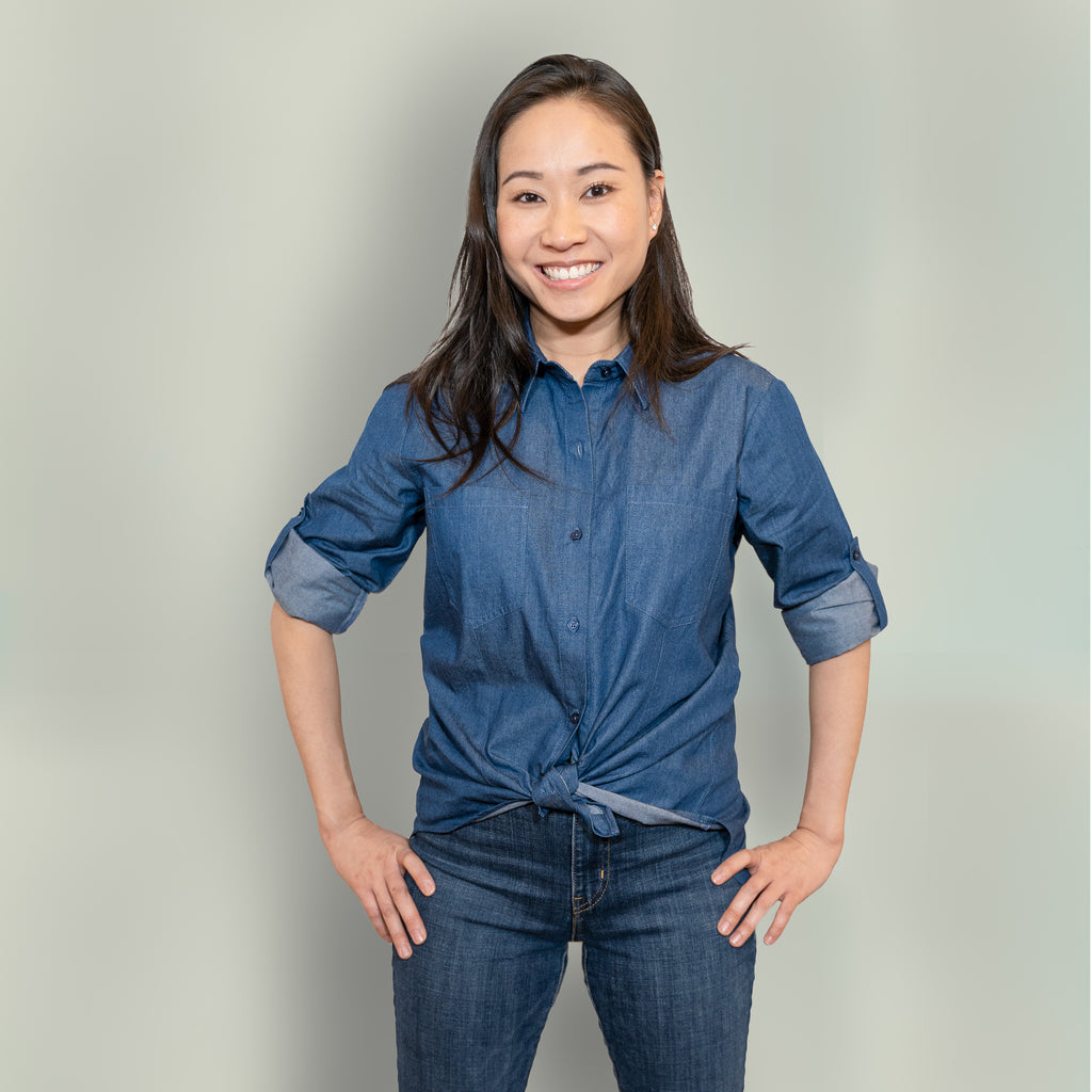 Women's chambray button down shirt with split back details, worn as tie front and rolled up sleeves, to match to kids' chambray shirt and dress, as well as men's button down chambray shirt. 