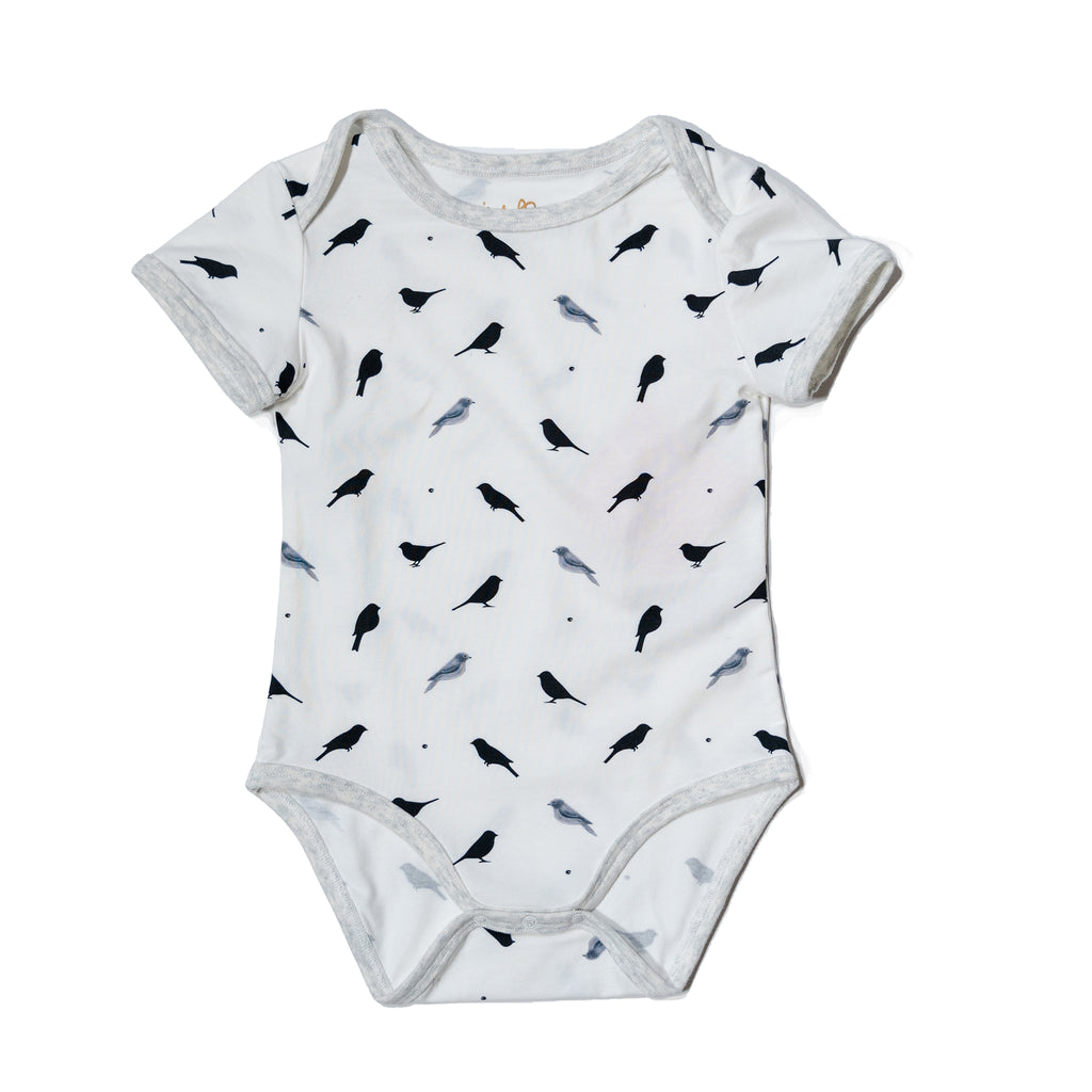 Black and white Birdie printed baby onesie dress, fun, monochramatic gender neutral print to twin match with siblings and family by Anise & Ava.