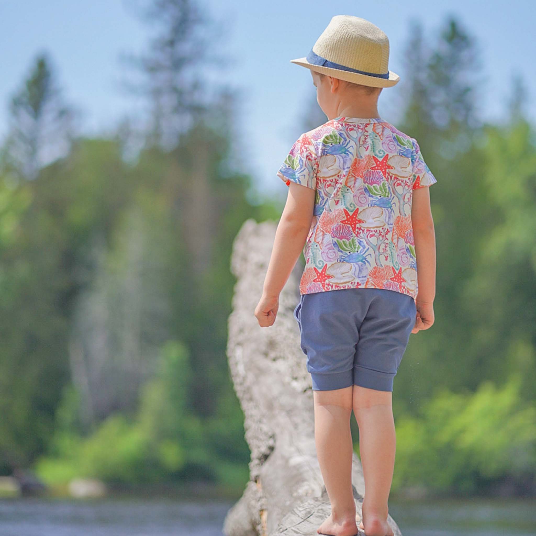 Anise & Ava genderless exclusive hand drawn artwork, eco friendly printed on luxury cotton. Anise & Ava short sleeves pocket tee, made and designed to match siblings' styles in baby onesies or other kids' dresses or shorts. 